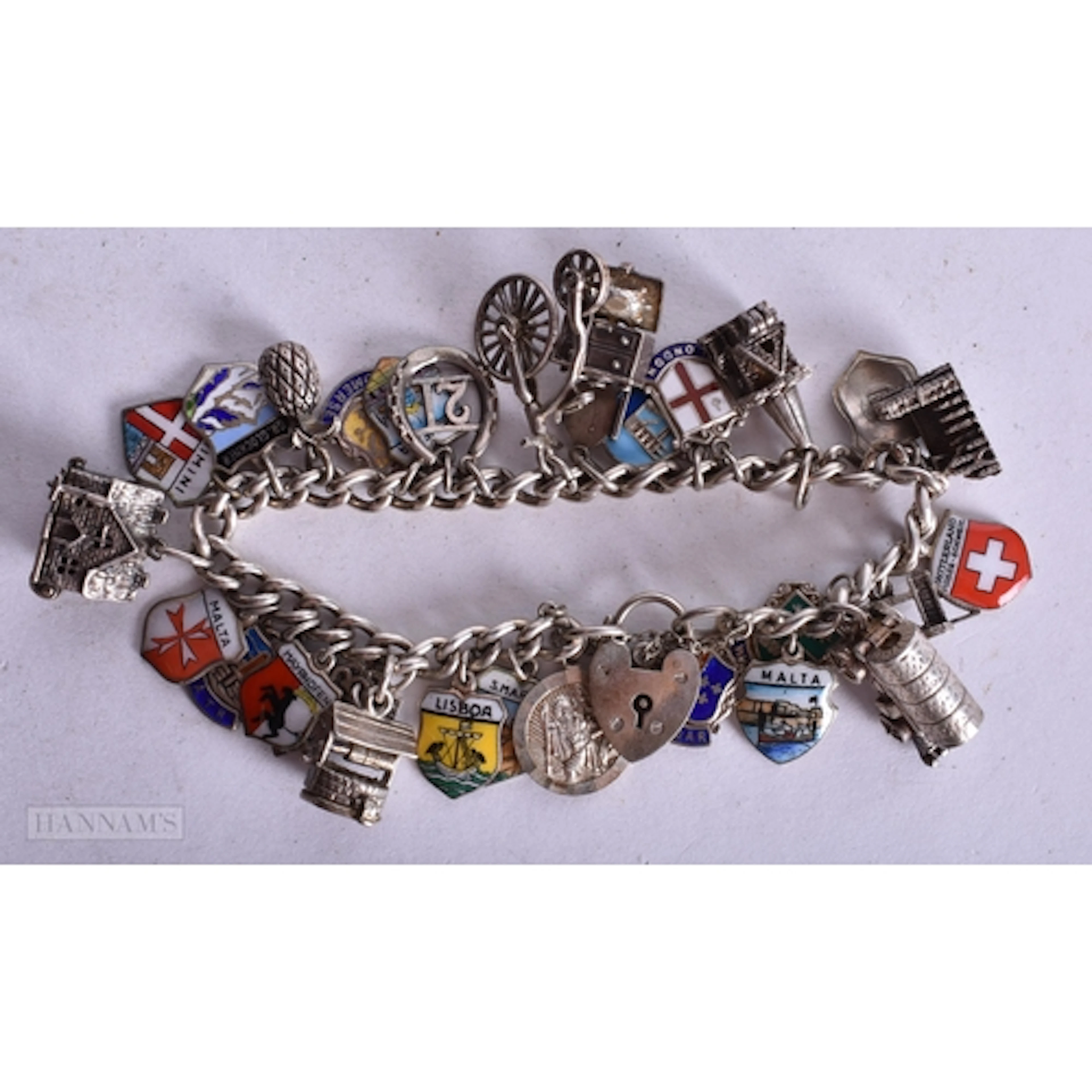A SILVER CHARM BRACELET. 70 grams. 18 cm long.