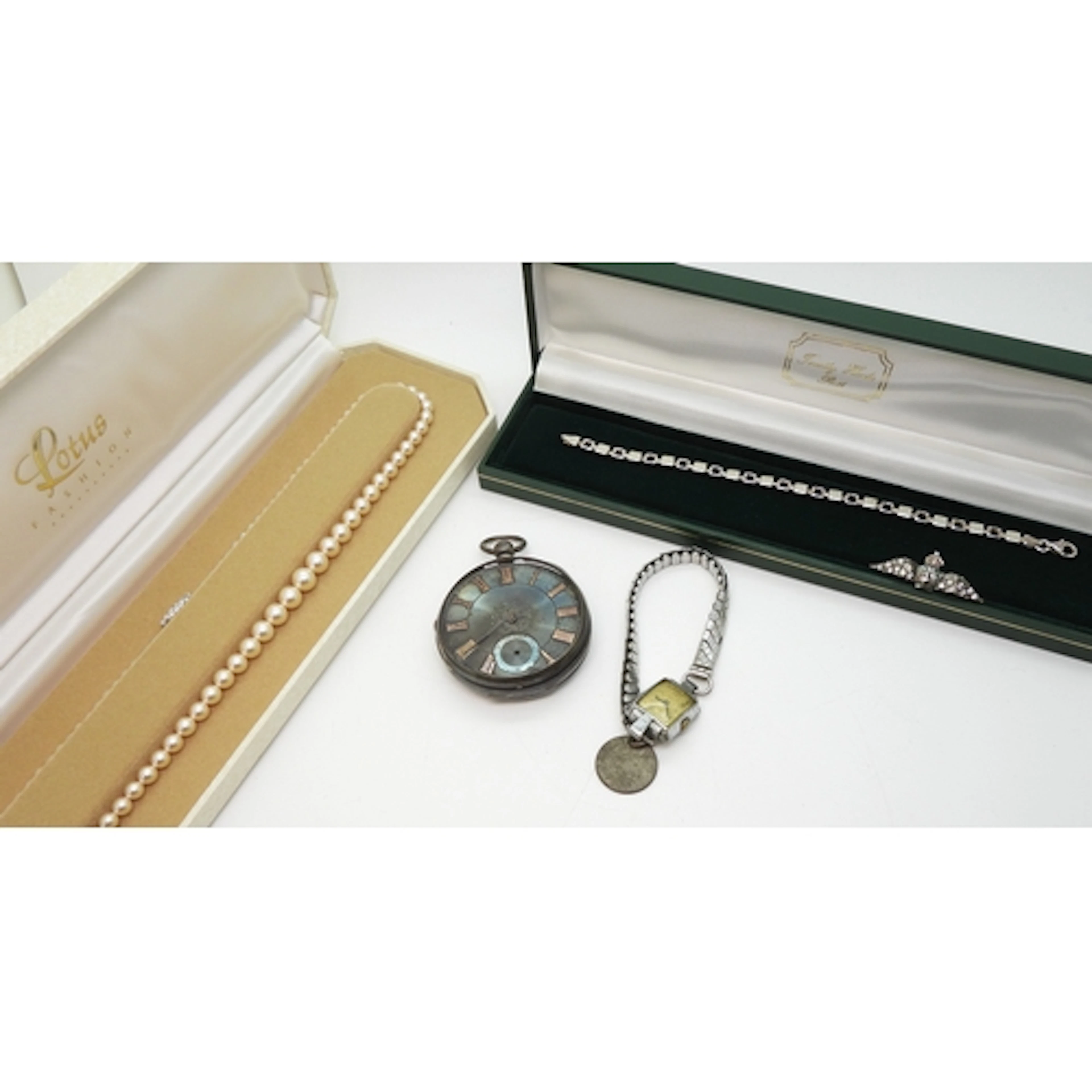 A silver cased open face pocket watch with decorative dial, ...