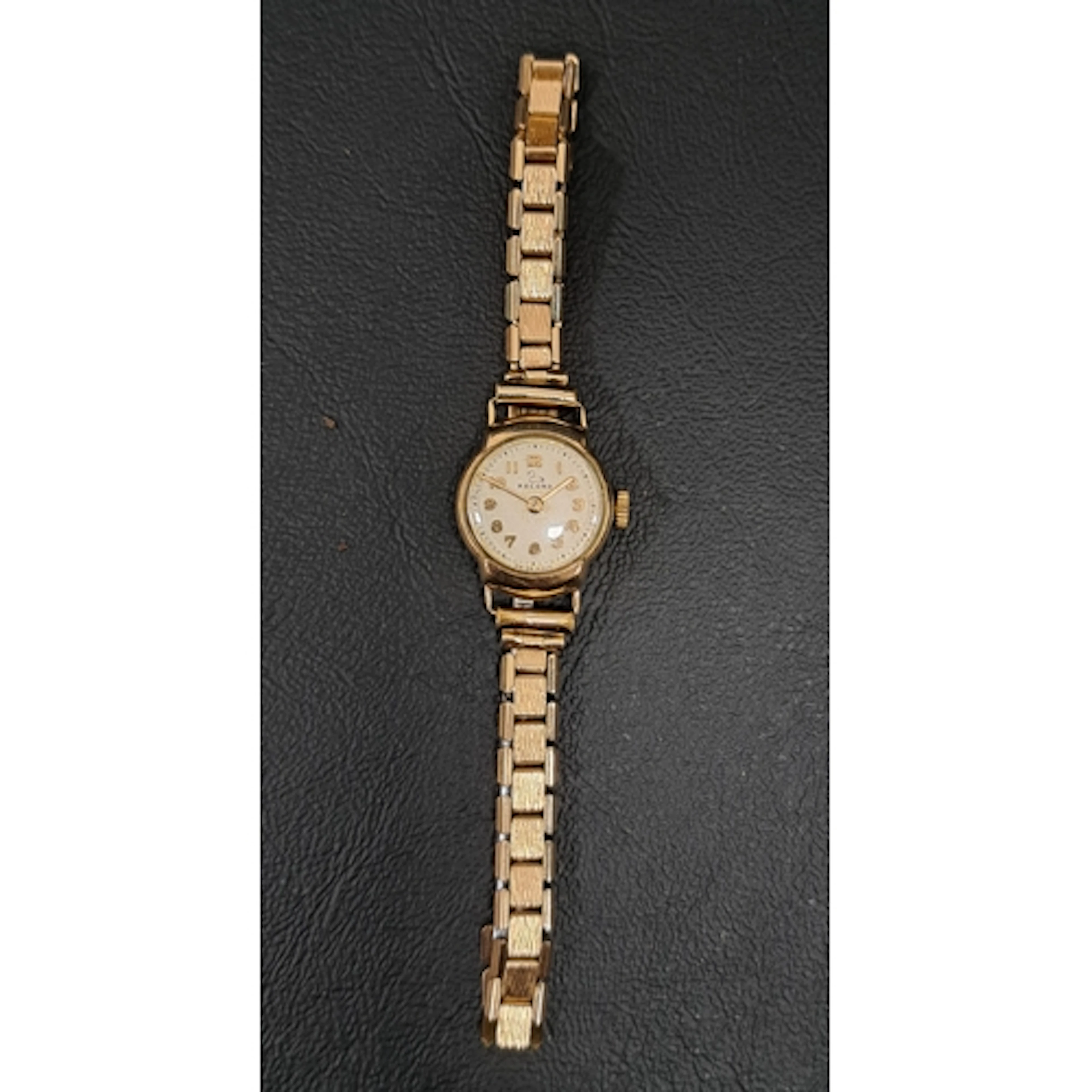 LADIES RECORD NINE CARAT GOLD CASED WRISTWATCH the dial with...