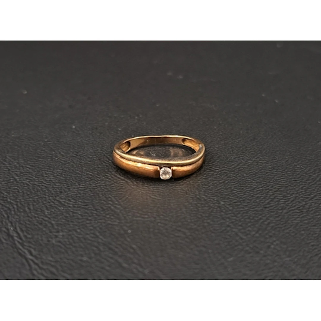 CZ SINGE STONE RING in nine carat gold, ring size L-M and a...