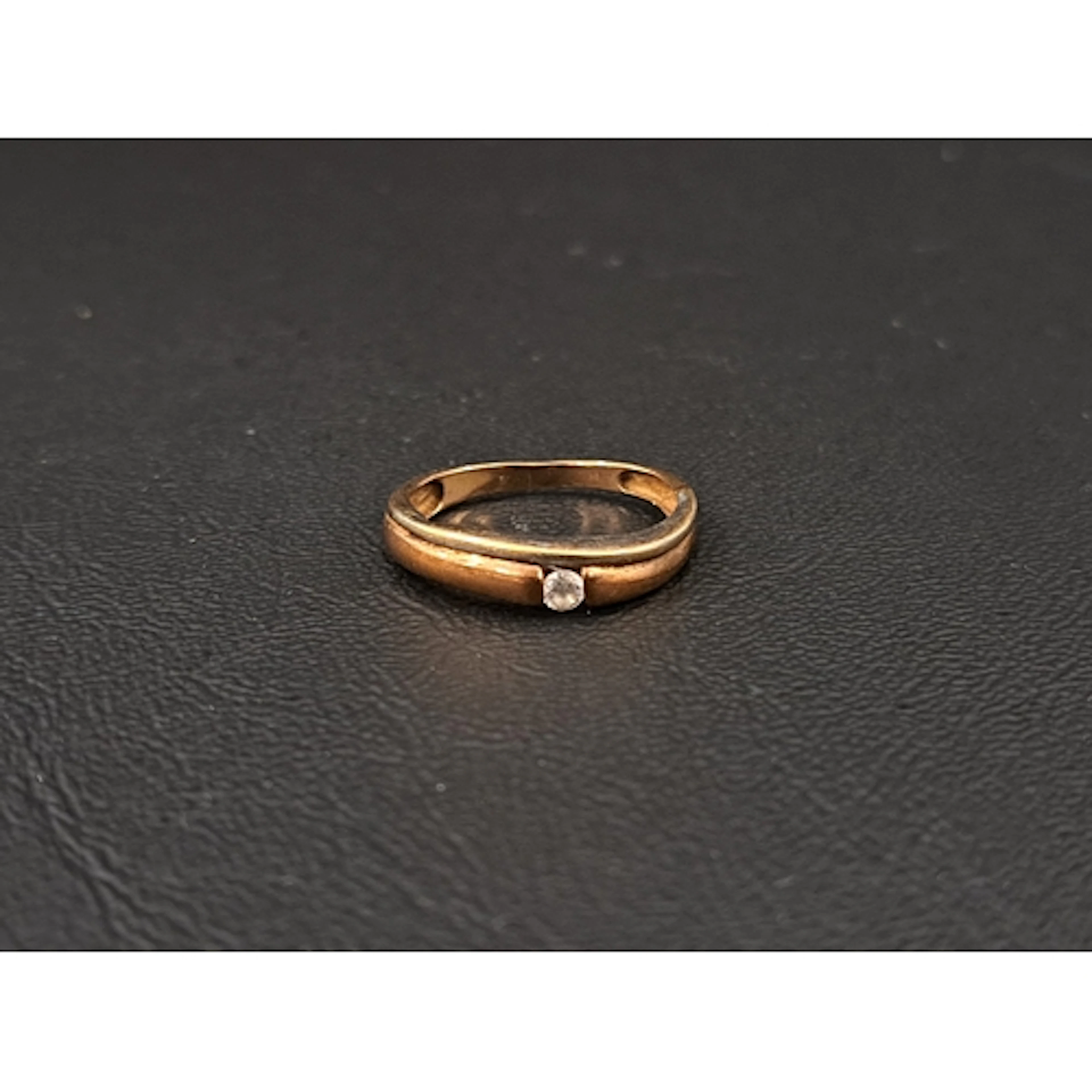 CZ SINGE STONE RING in nine carat gold, ring size L-M and a...