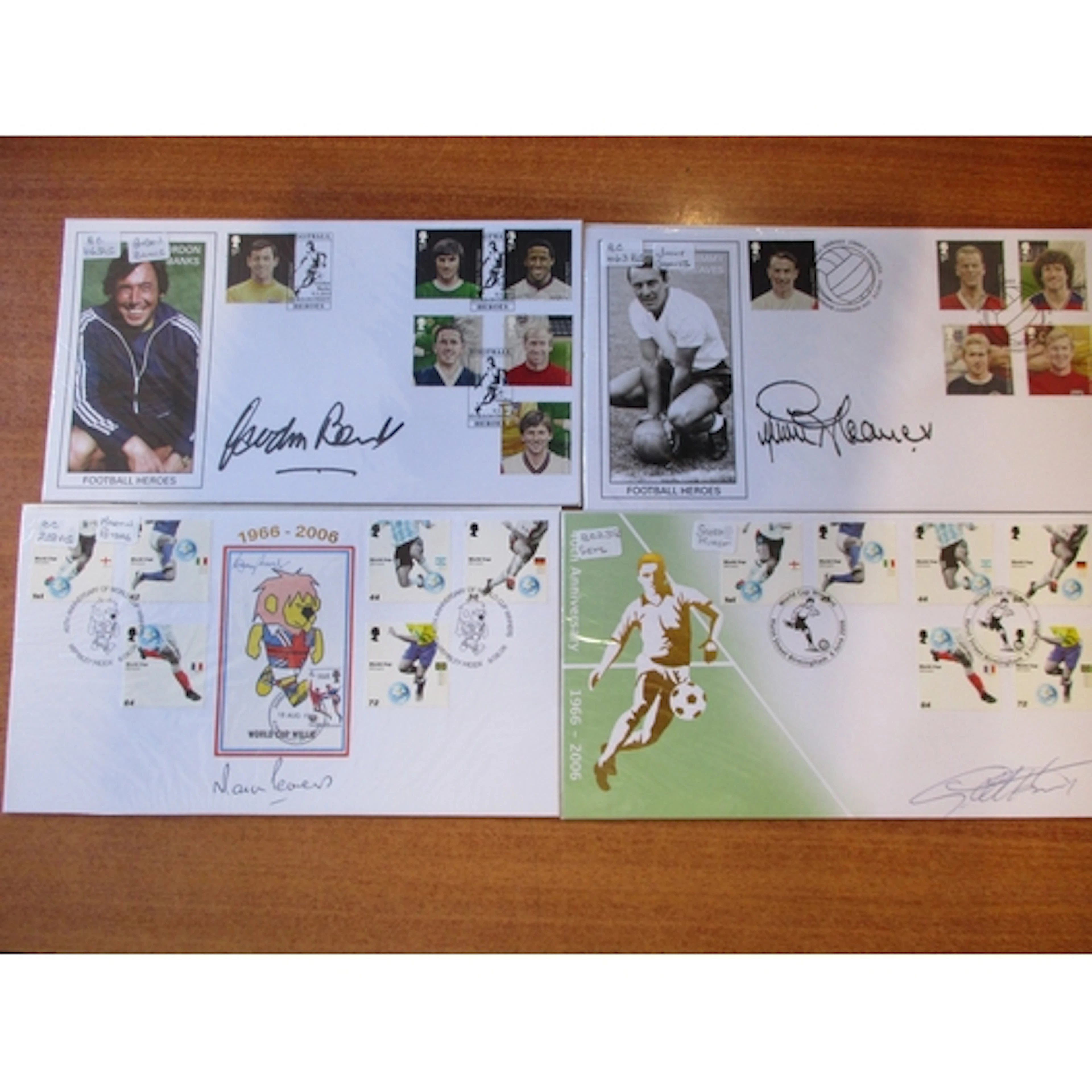 Large range of signed Buckingham covers incl Roger Moore, Ji...