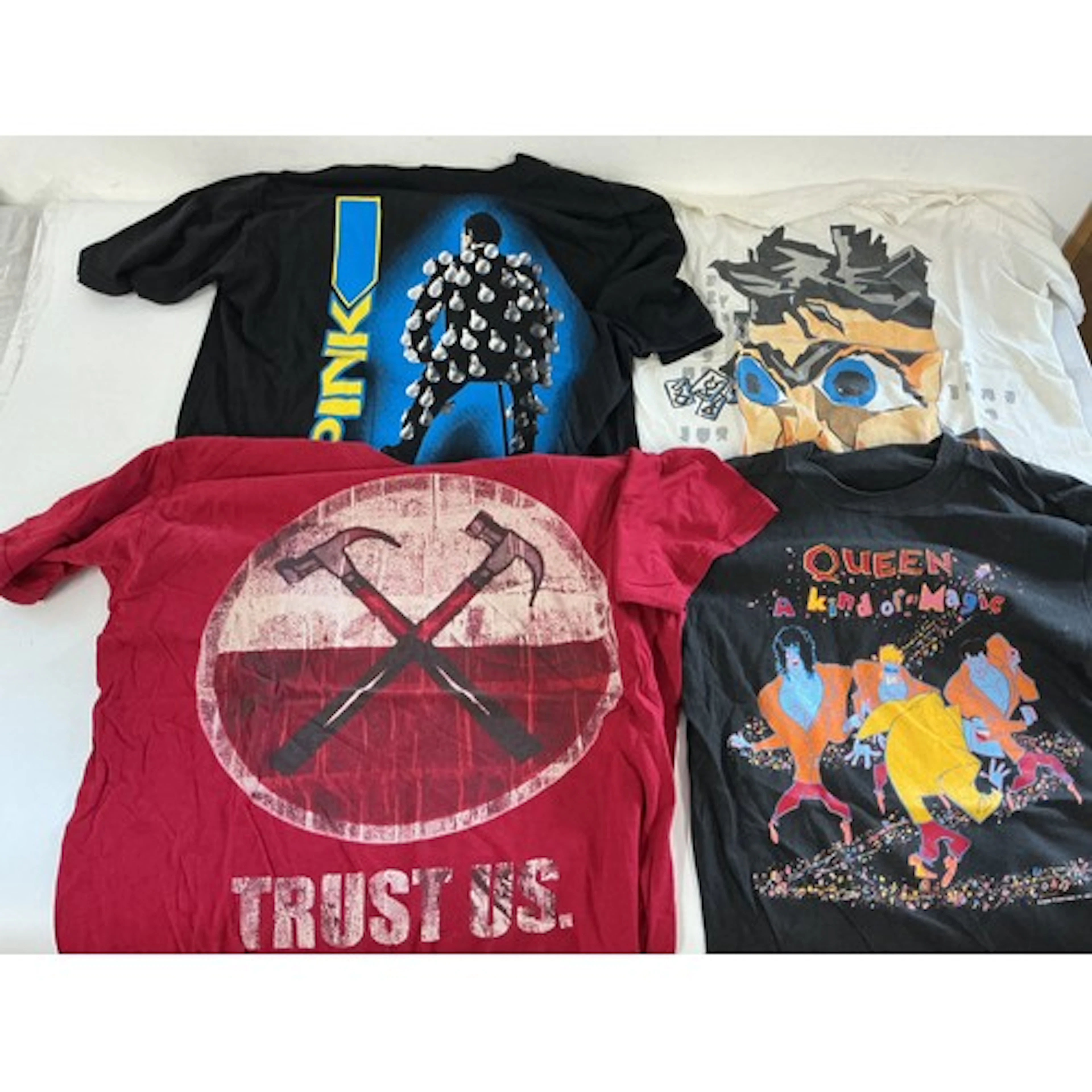 A collection of band tour T shirts for various artists inclu...