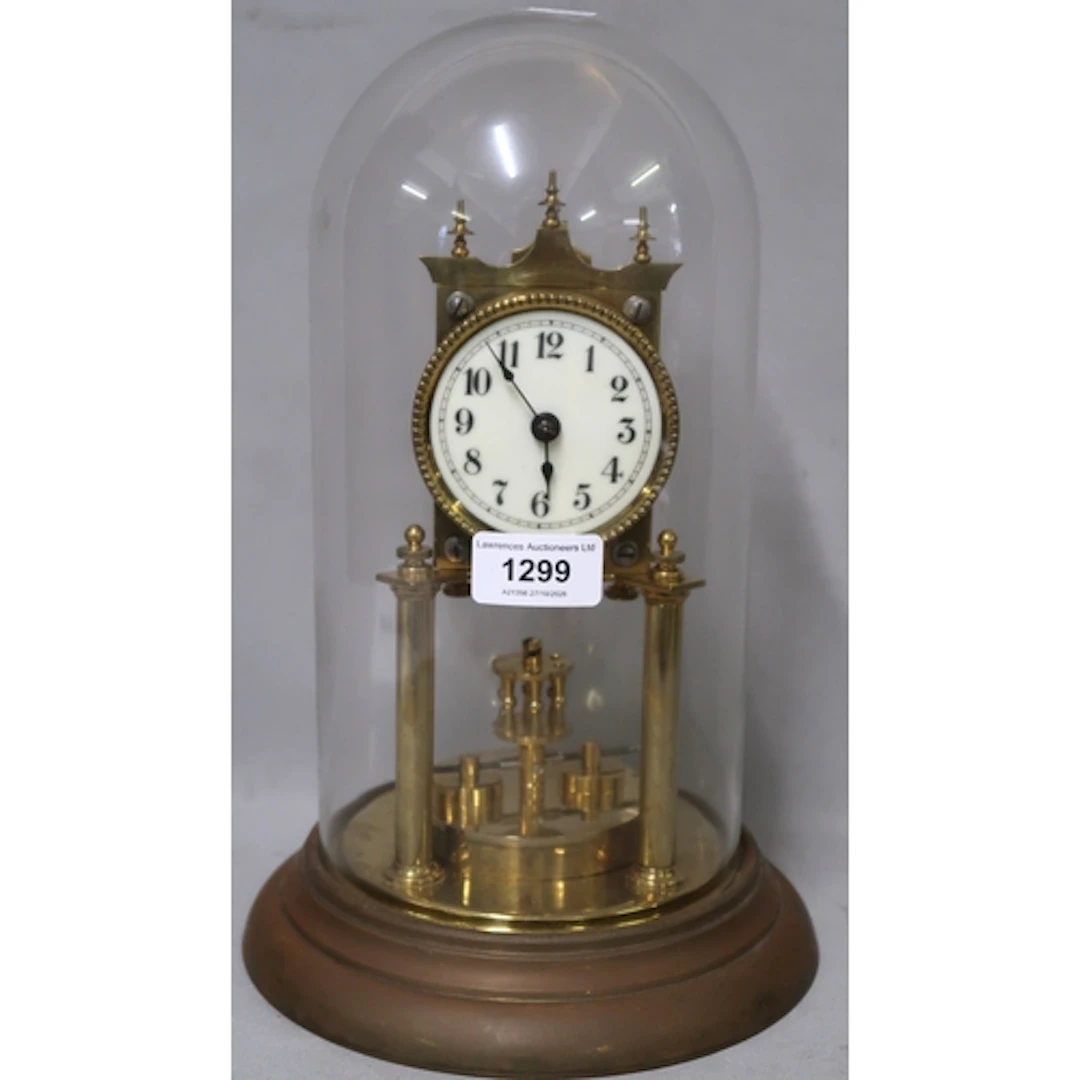 Three various brass three hundred day clocks, with glass dom...
