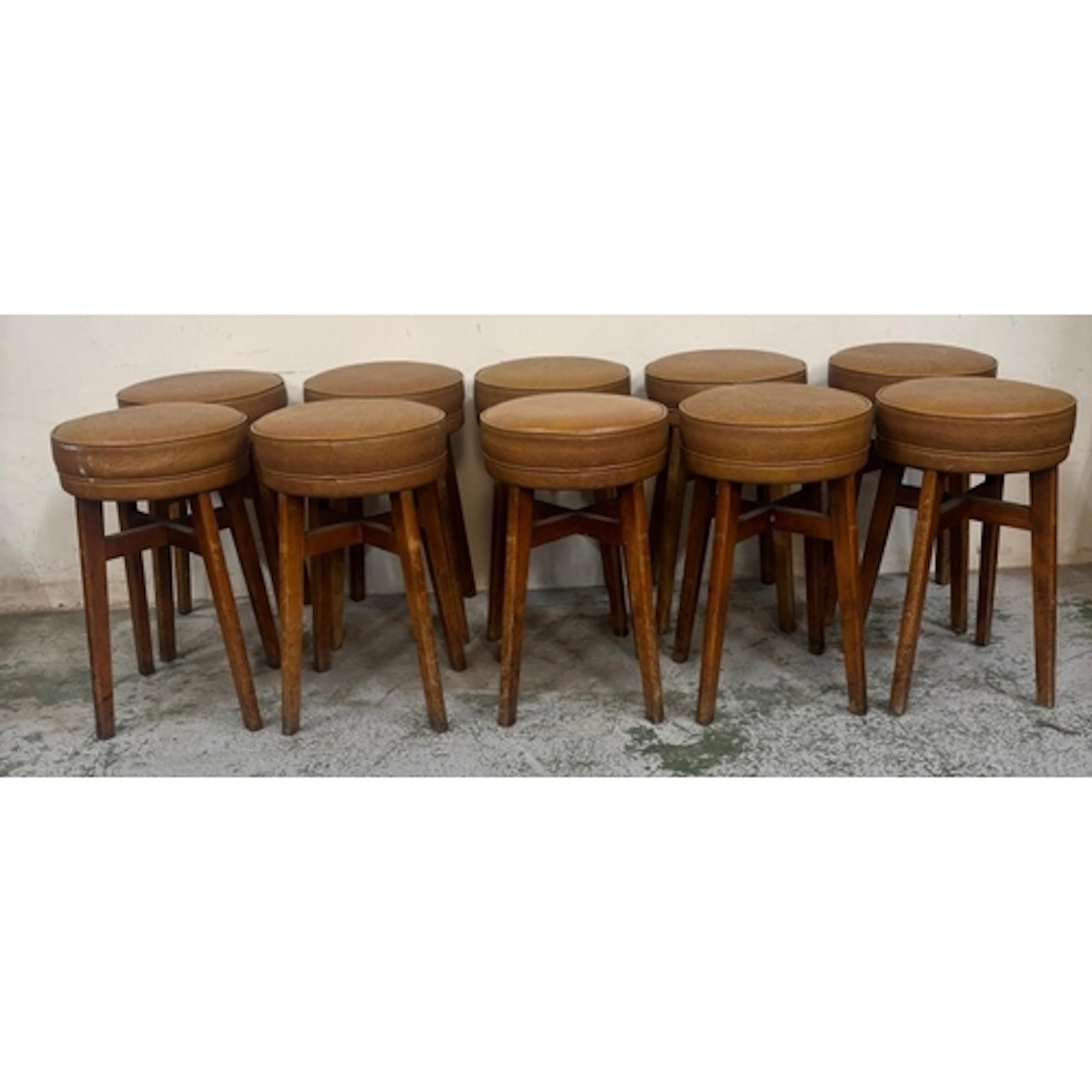 Ten vintage-style stools by Benchairs featuring circular vin...