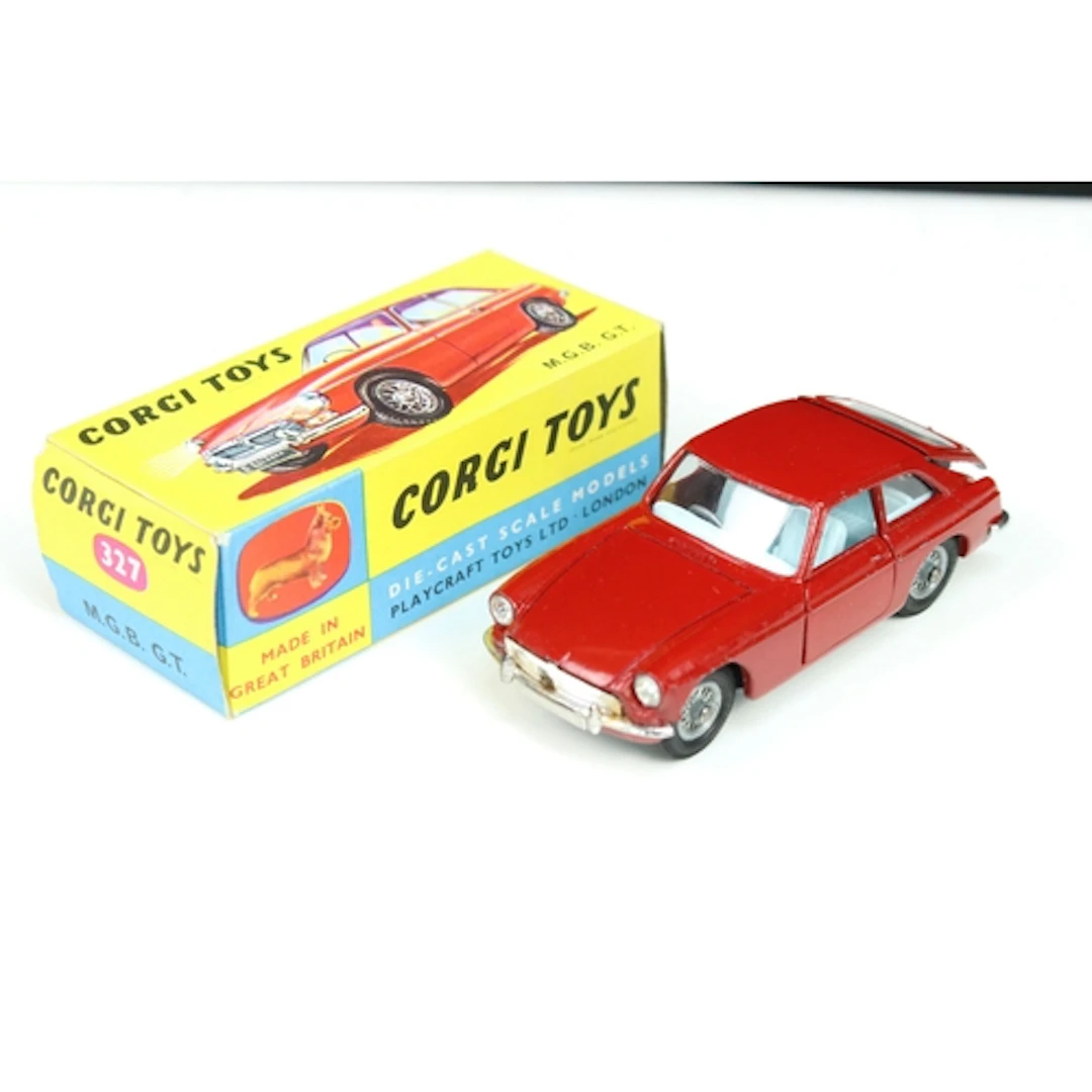Boxed Corgi 327 MGB GT diecast model in dark red with pale b...