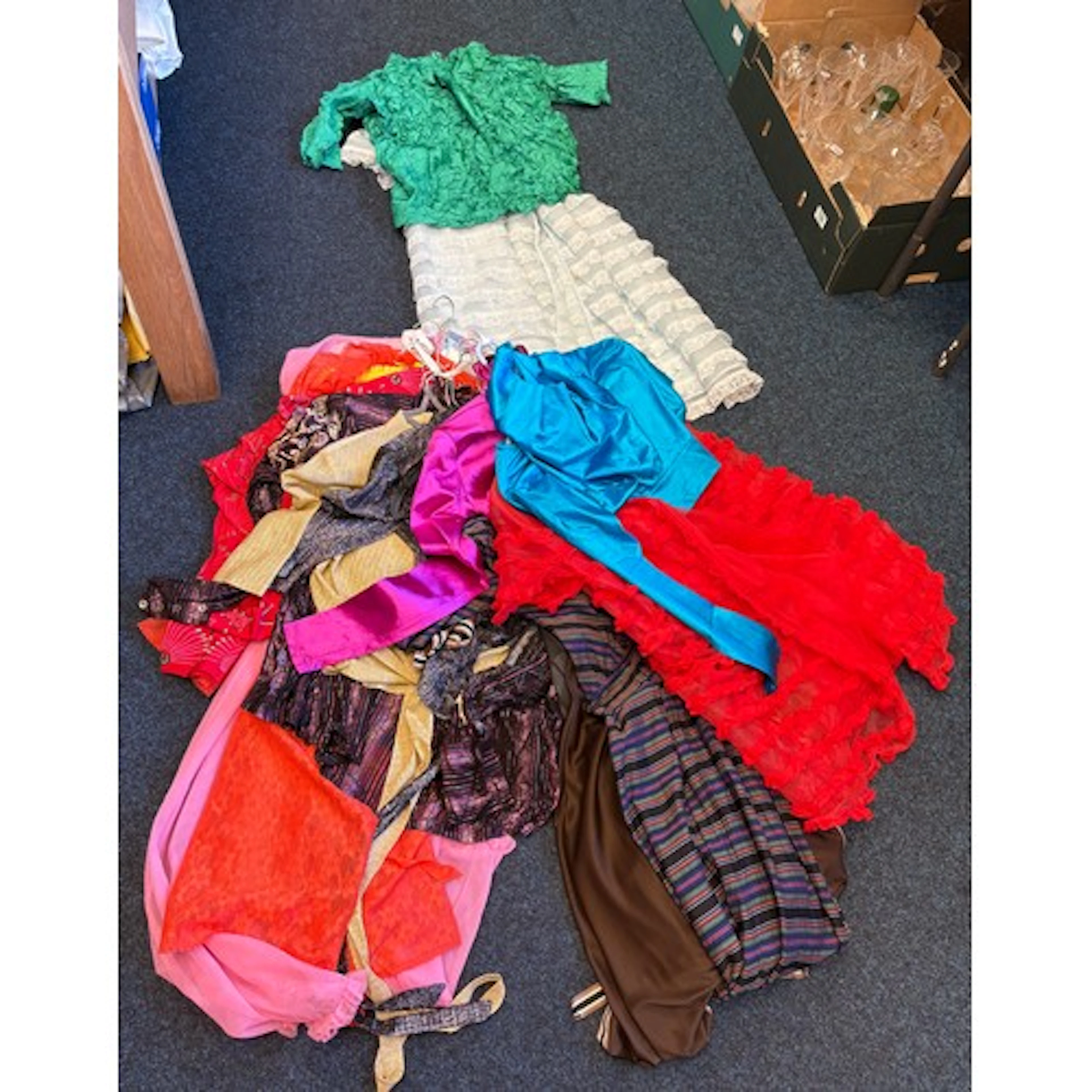a collection of ladies retro clothes. One bearing the label ...
