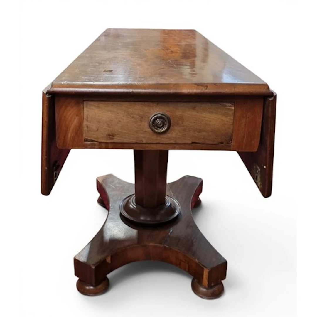 An unusual early 19th Century Mahogany three pillar Dining T...