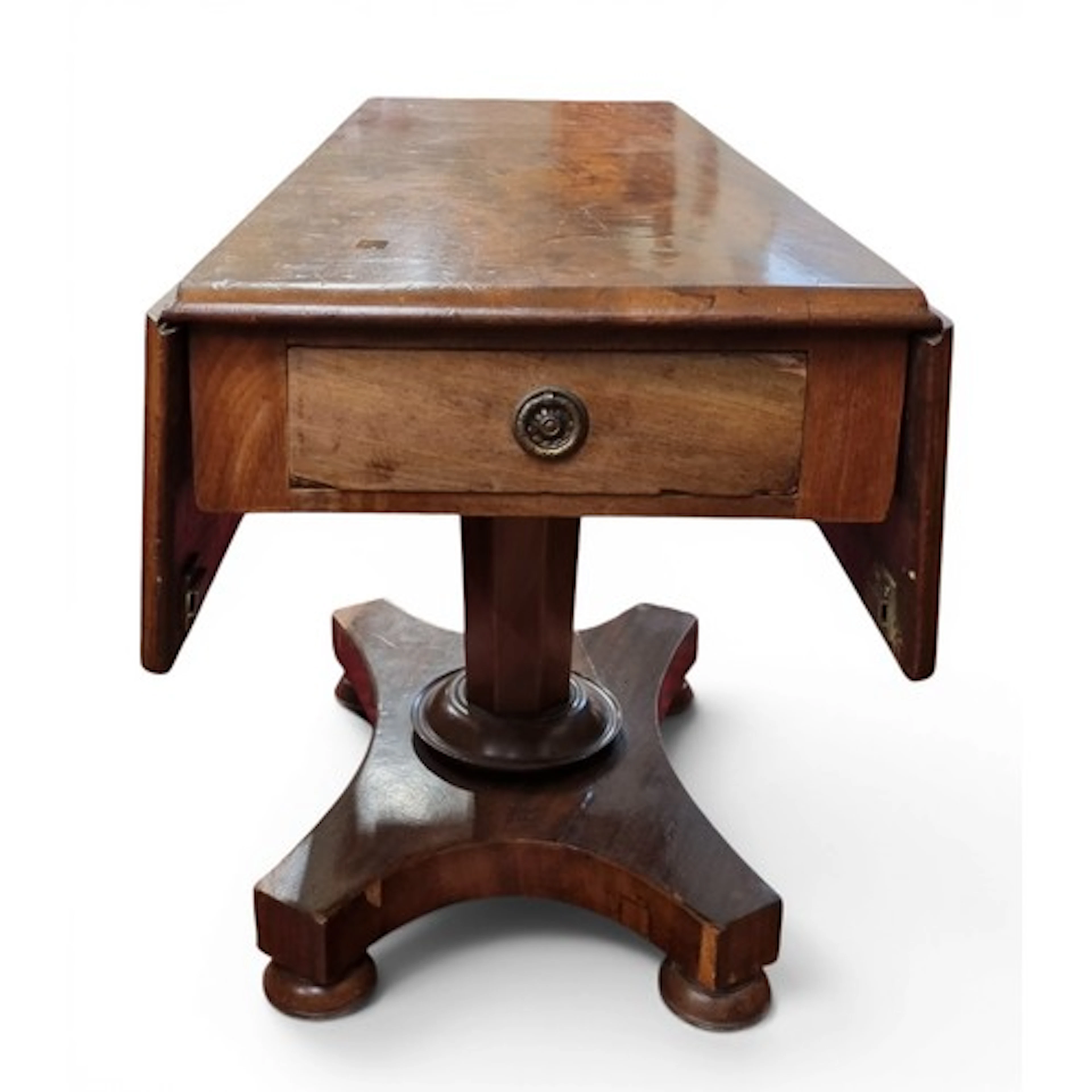 An unusual early 19th Century Mahogany three pillar Dining T...