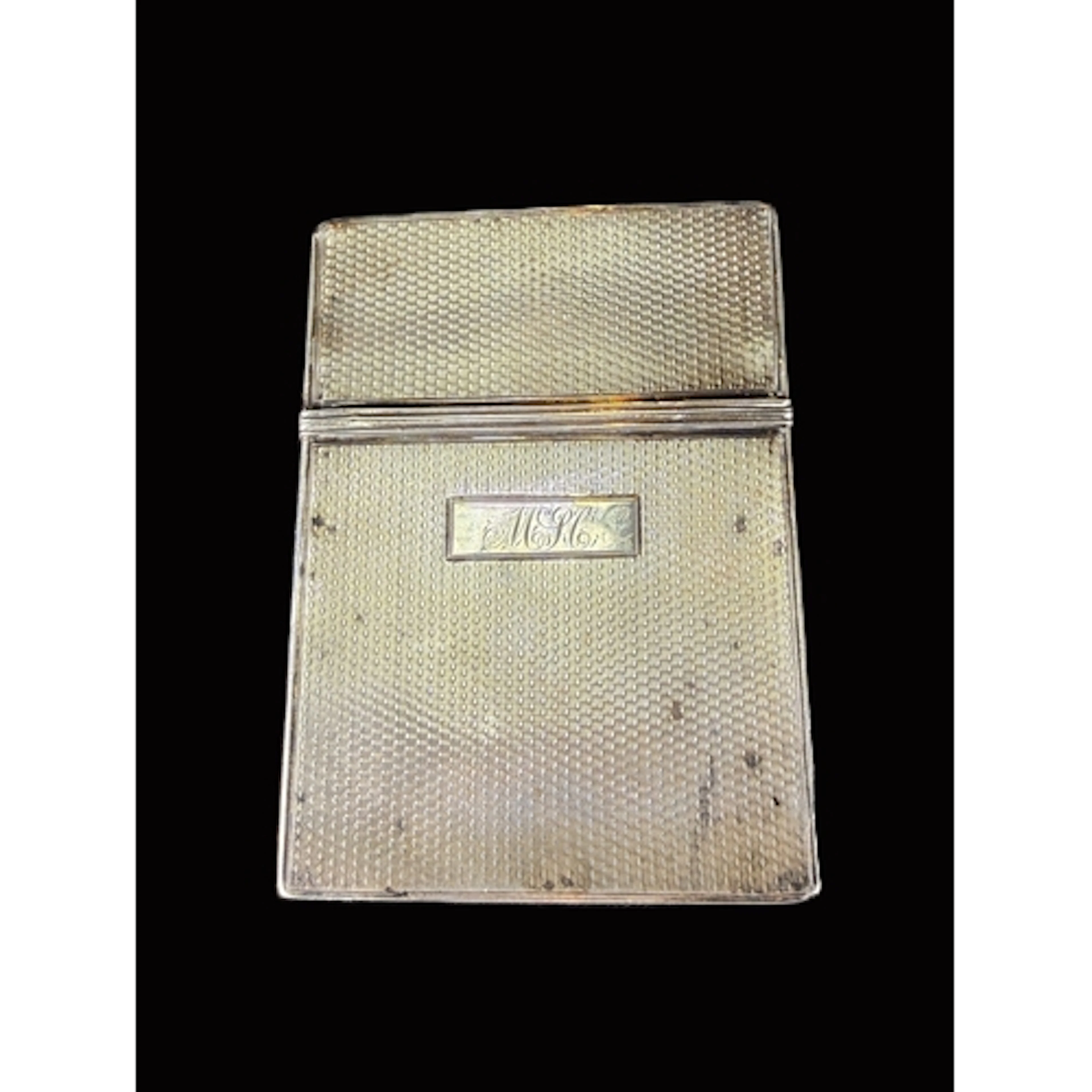 An engine turned rectangular hallmarked silver card case, mo...