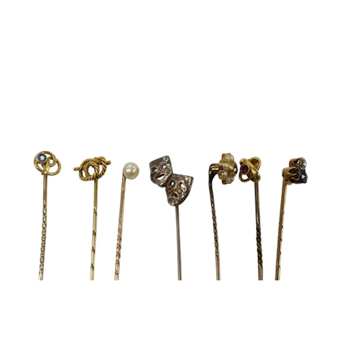 A collection of seven assorted early 20th century stick pins...