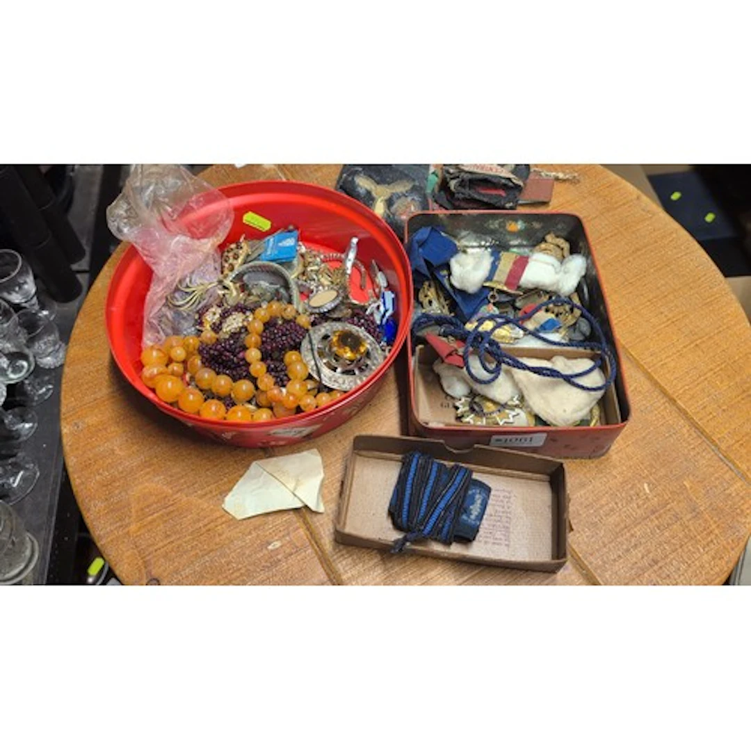 A mixed collection of costume jewellery, wristwatches, ename...