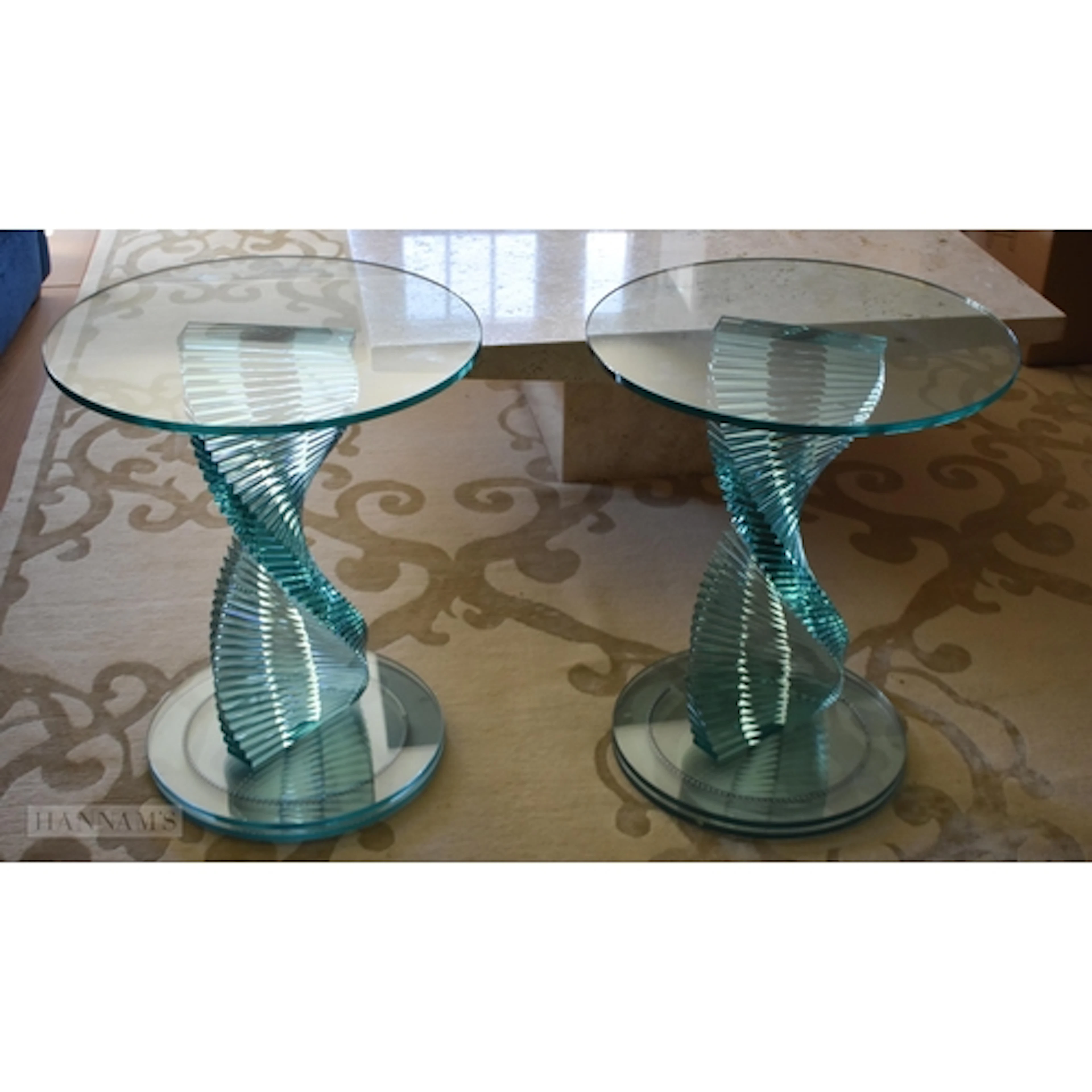 A pair of Italian glass revolving tables by Tonelli 61 x 50c...