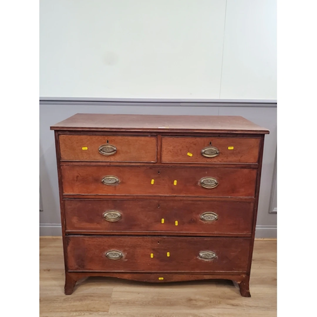 An oak Chest of Drawers fitted two short over three long rai...