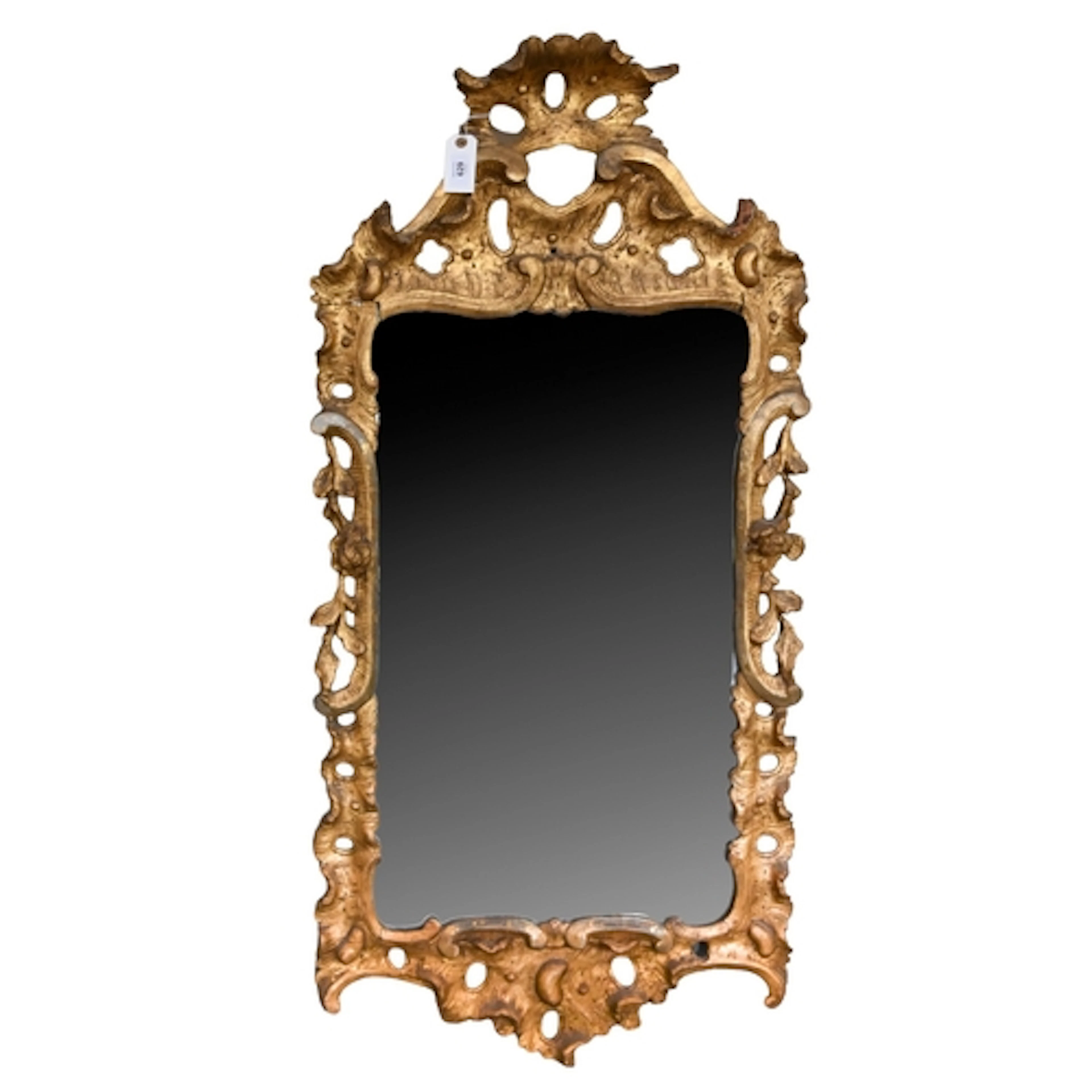 A George III giltwood and composition mirror, carved and pie...