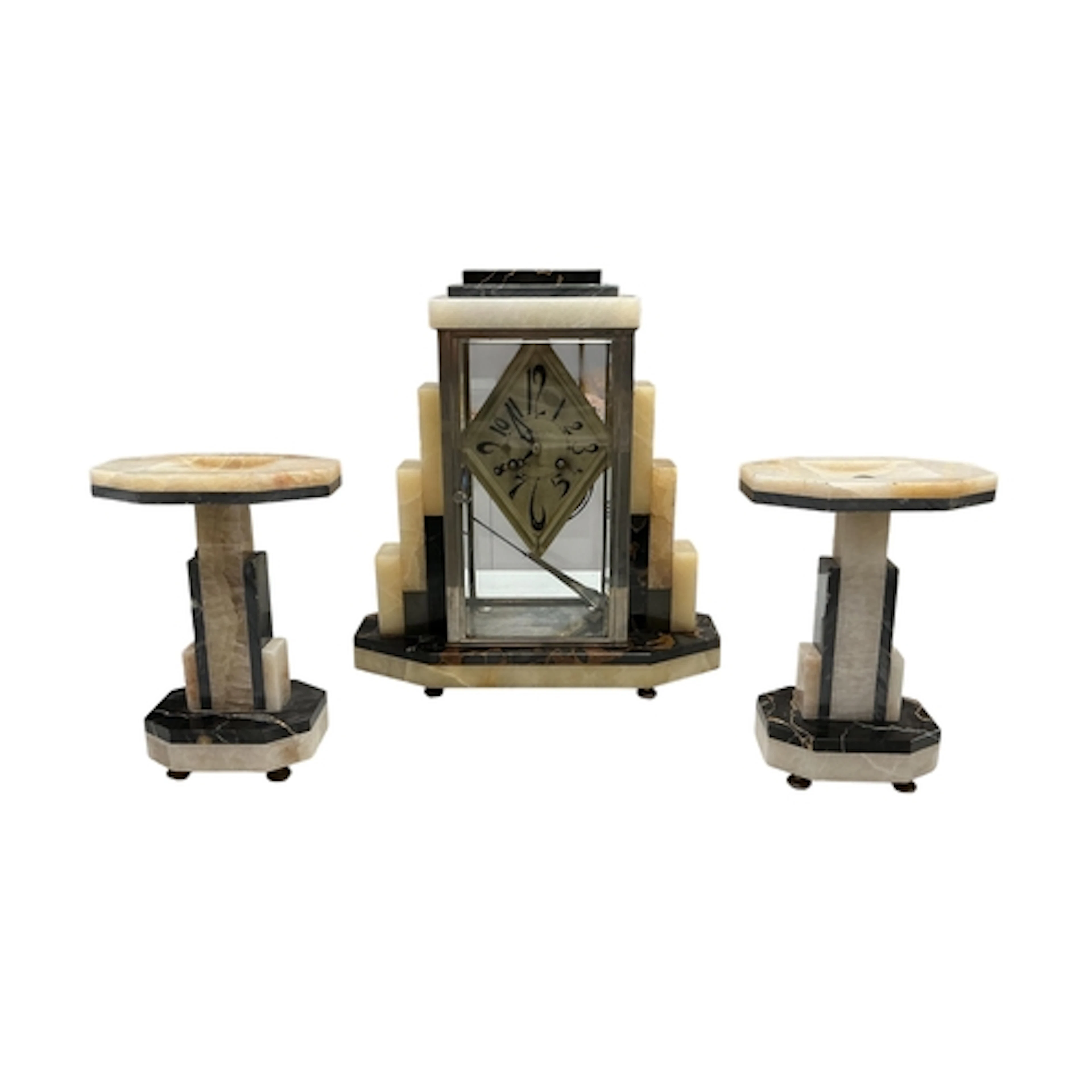 An Art Deco marble and alabaster clock garniture, circa 1930...