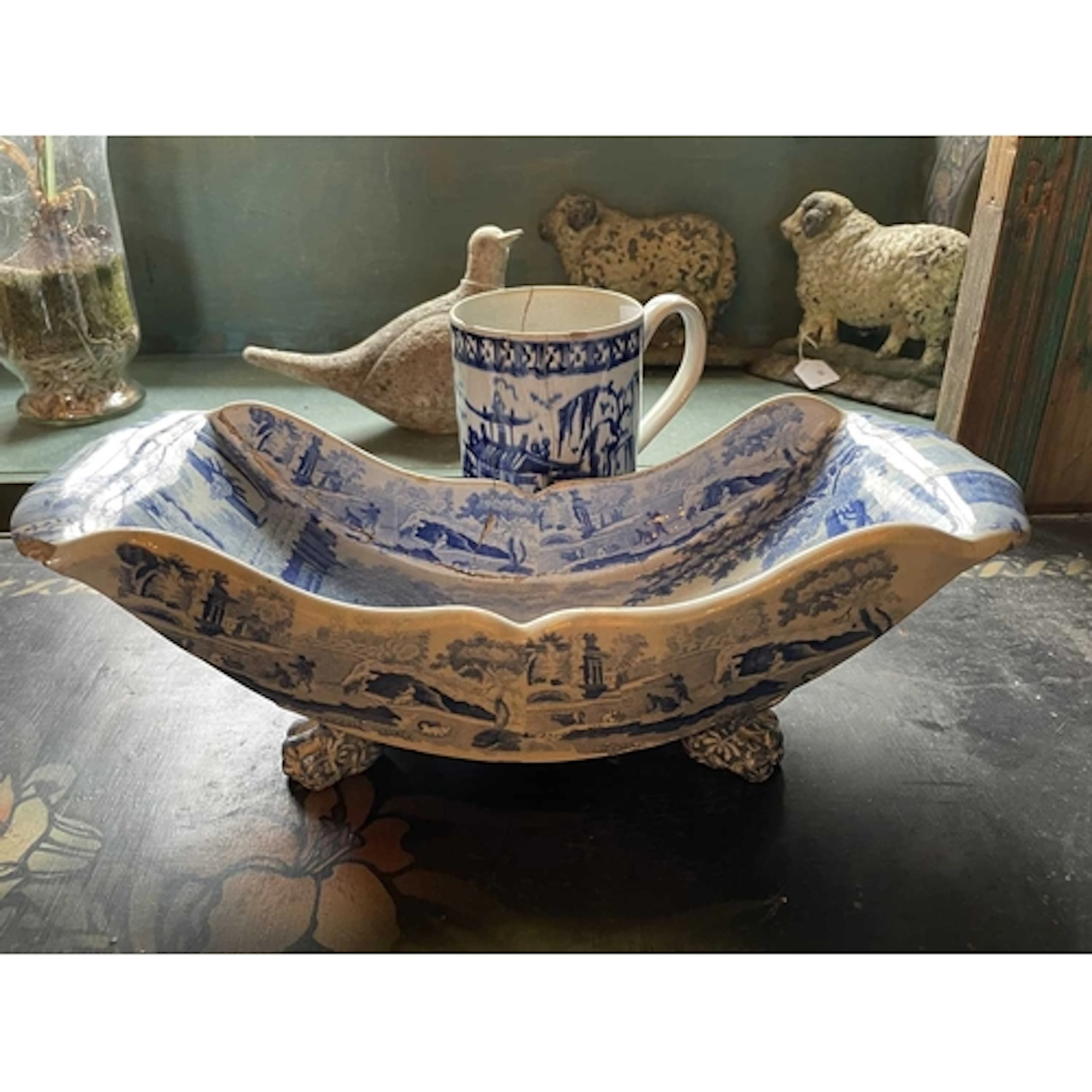 A Staffordshire blue and white pottery cheese coaster. Circa...