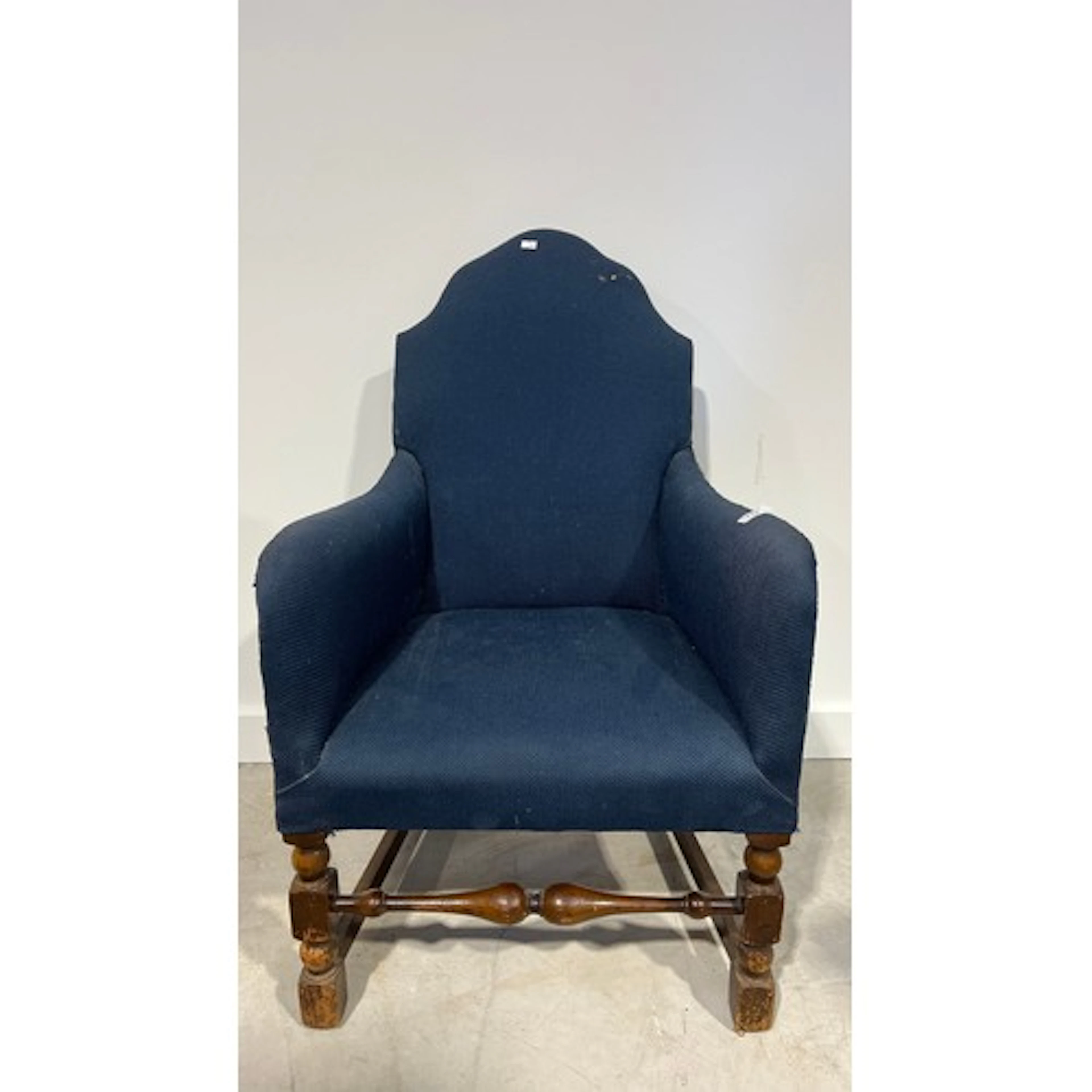 Blue upholstered armchair.