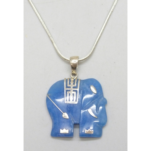 A silver mounted possibly blue jade elephant pendant, 3.5cm ...