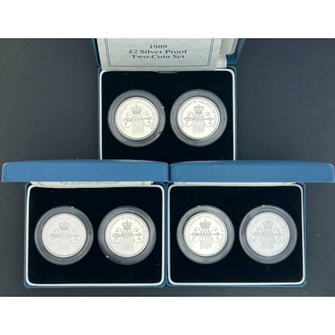 1989 UK QEII silver proof £2 two-coin sets x3, each comprisi...