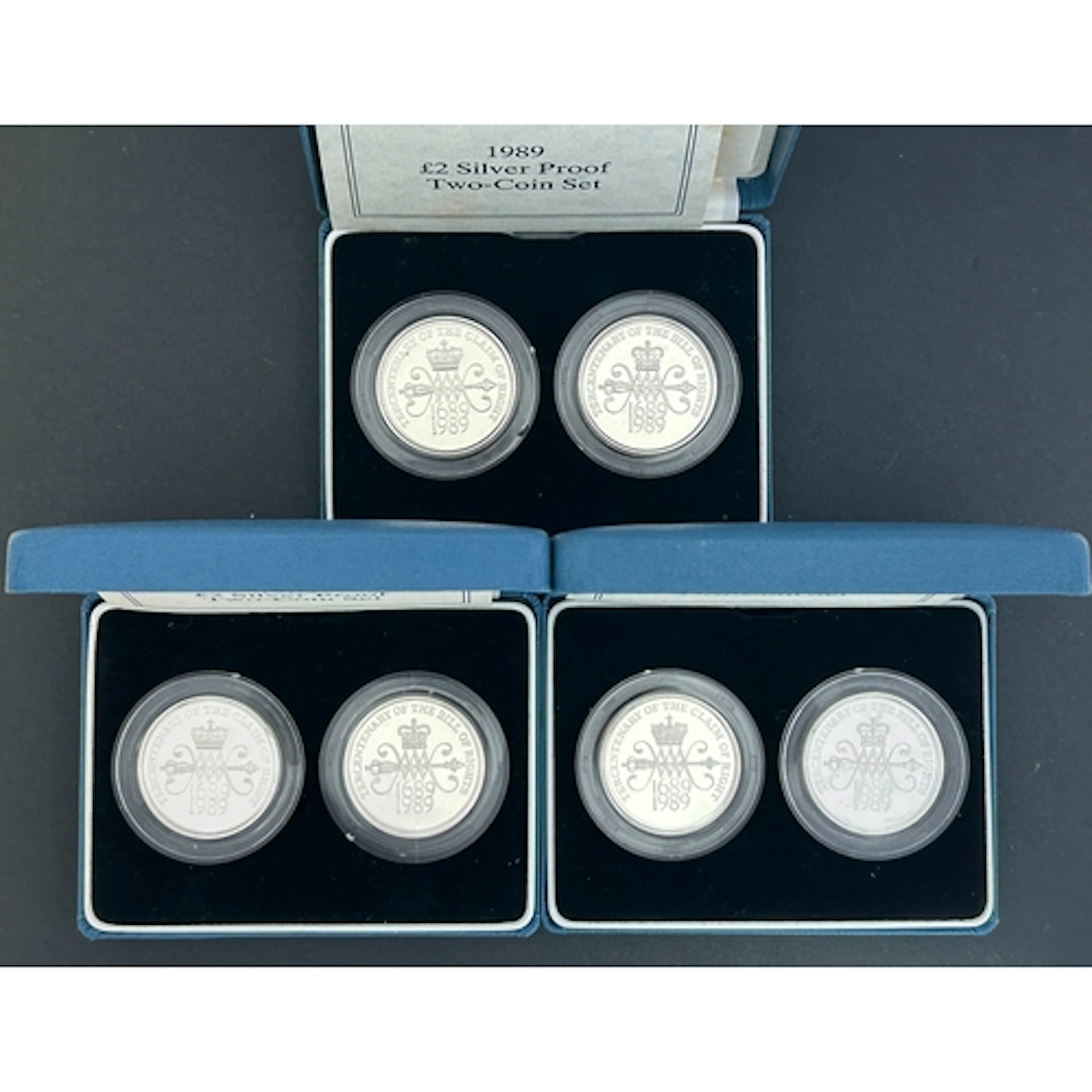 1989 UK QEII silver proof £2 two-coin sets x3, each comprisi...