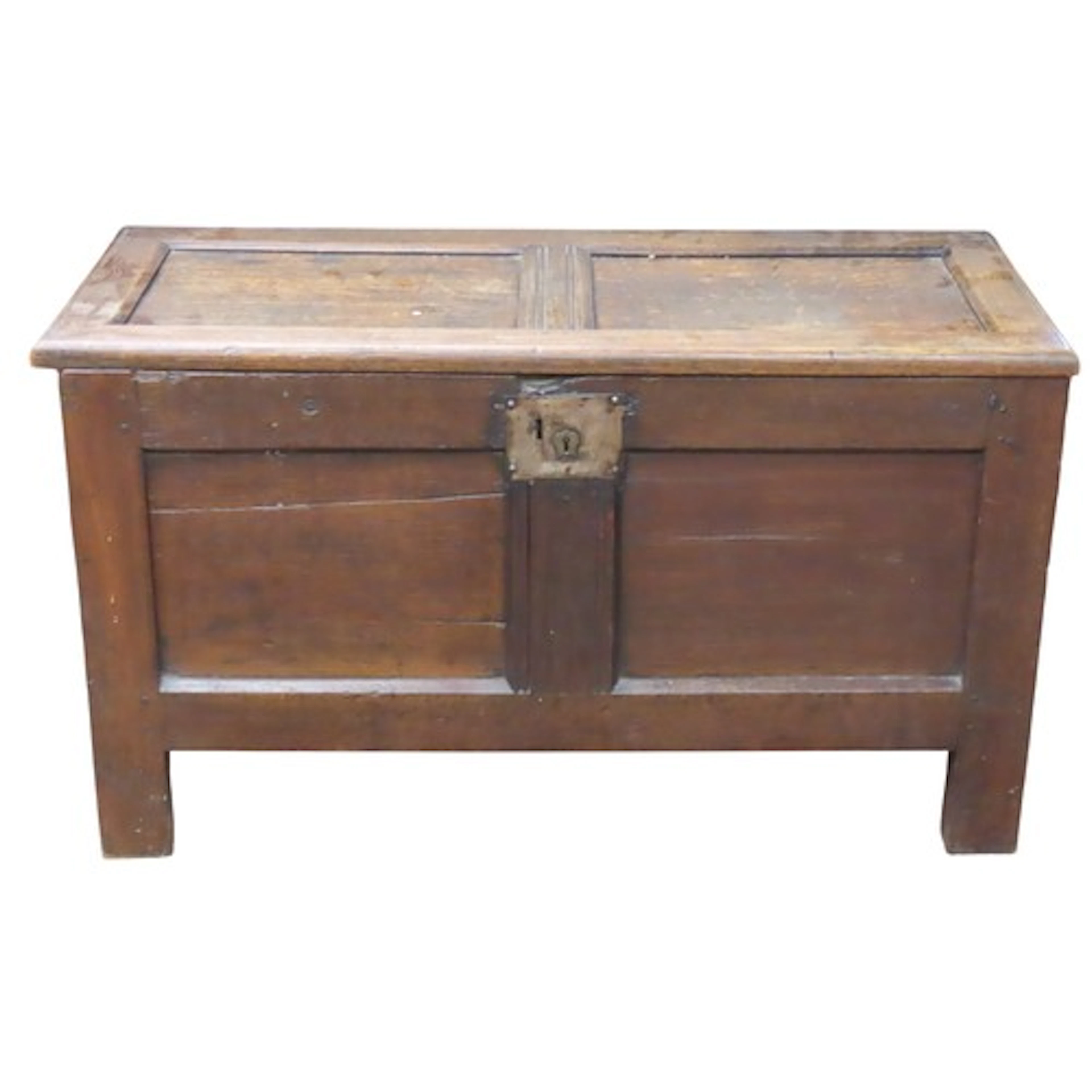 A small antique oak coffer with hinged lid and panelled fram...