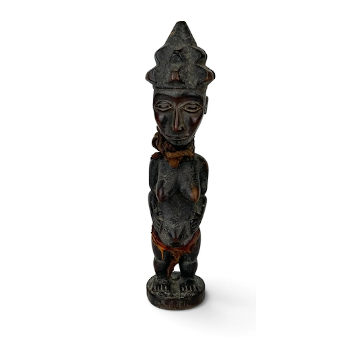 AN AFRICAN TRIBAL FIGURE Collection label attached to base, ...