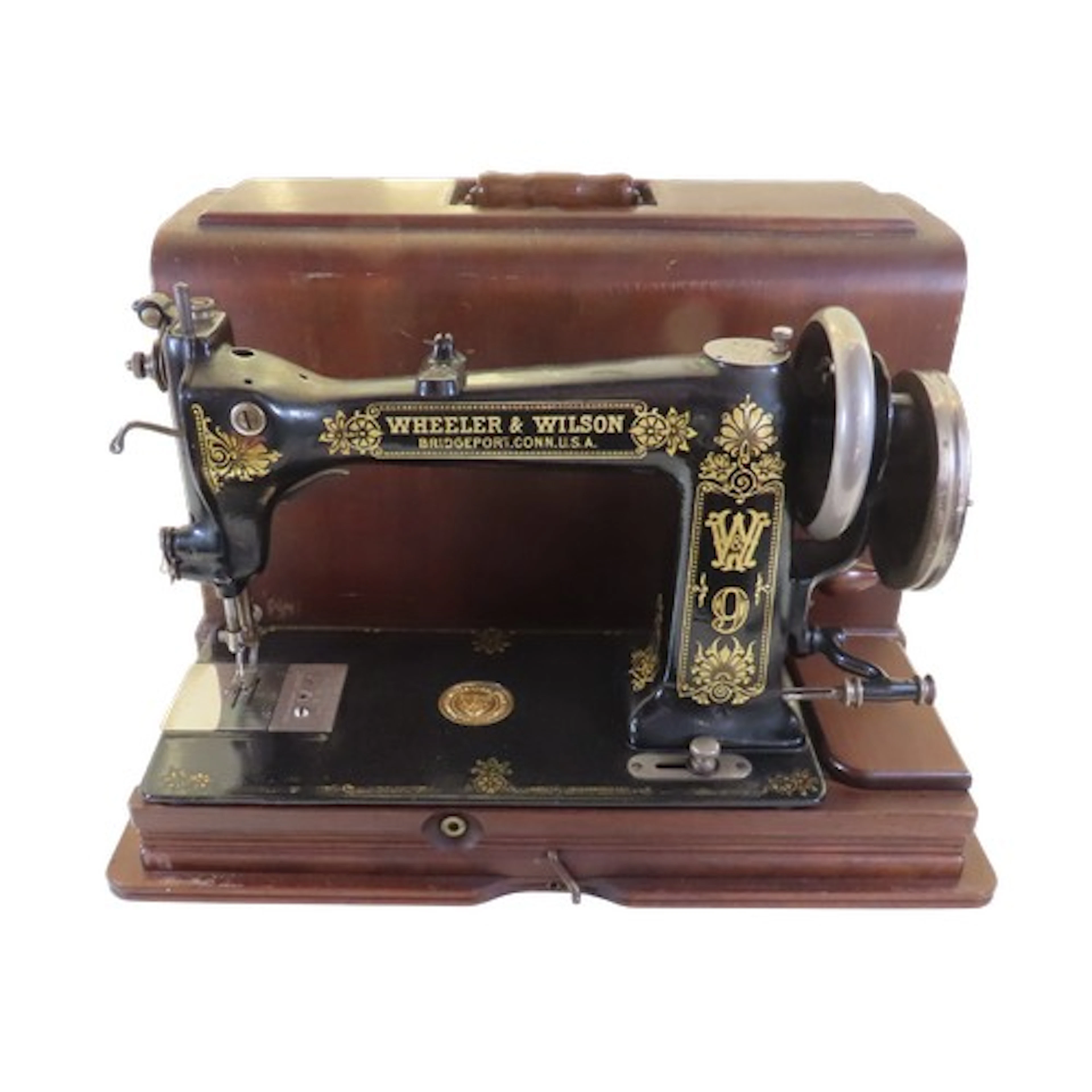 An early mahogany cased Wheeler & Wilson sewing machine