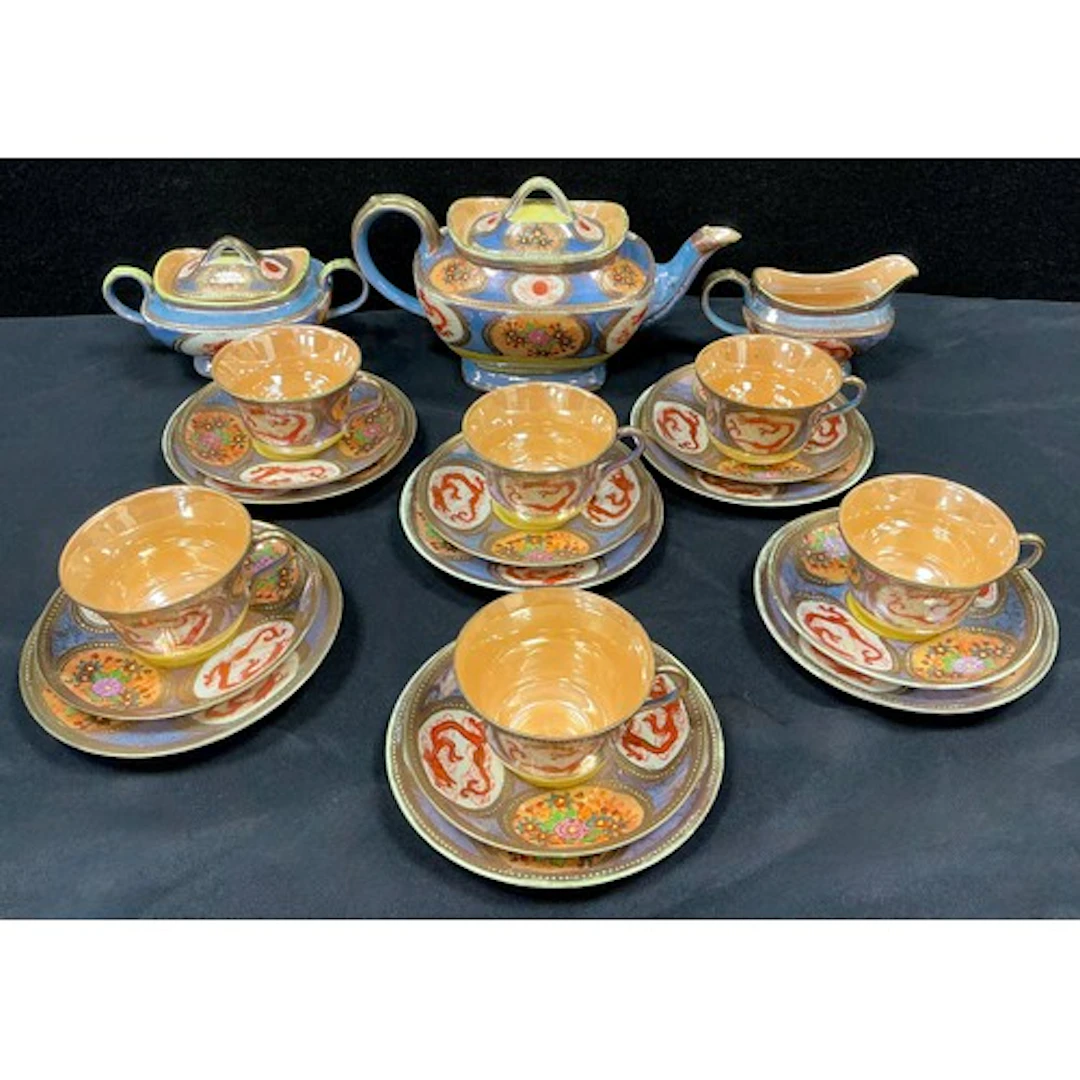 A mid 20th century Japanese tea service for six, with gilt j...