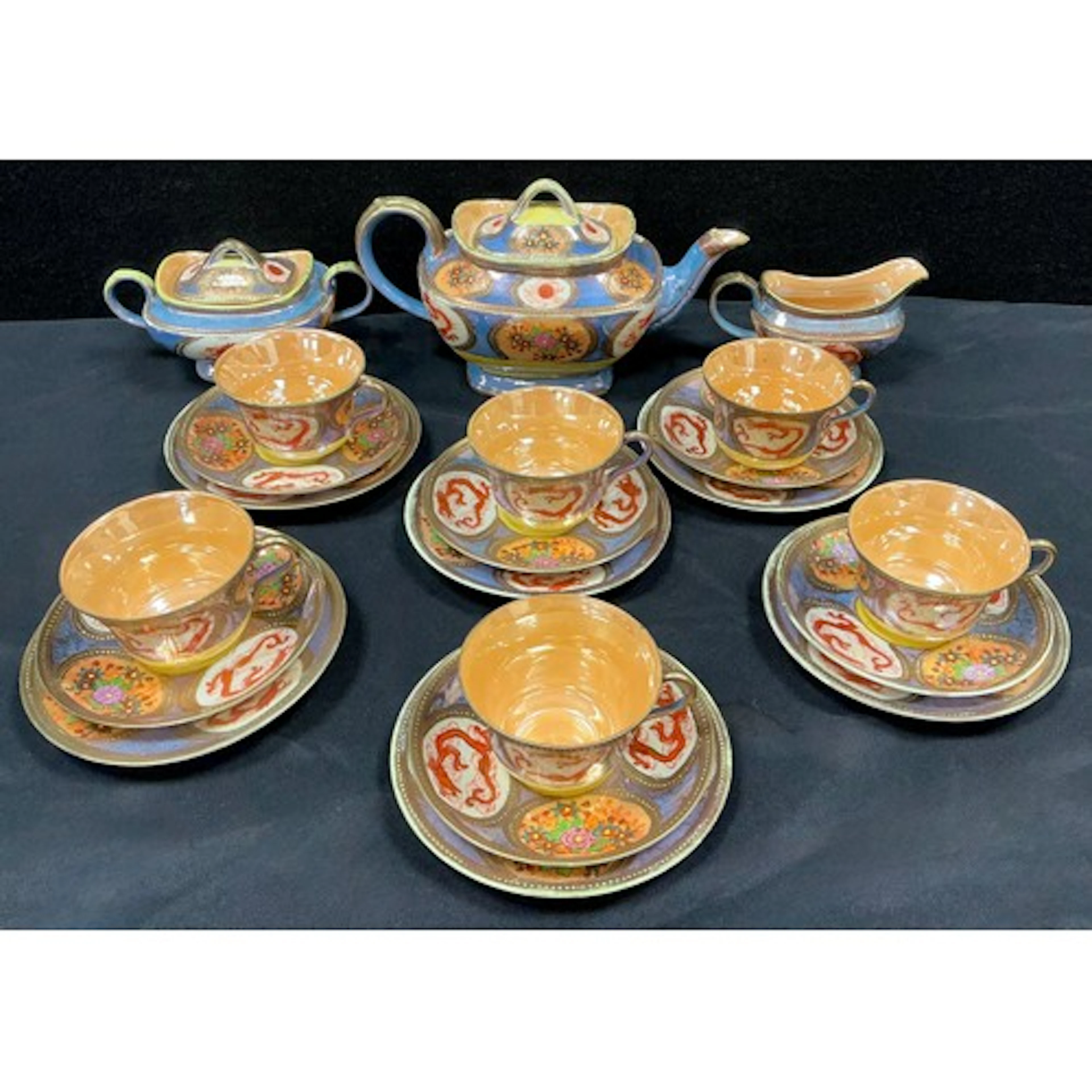 A mid 20th century Japanese tea service for six, with gilt j...