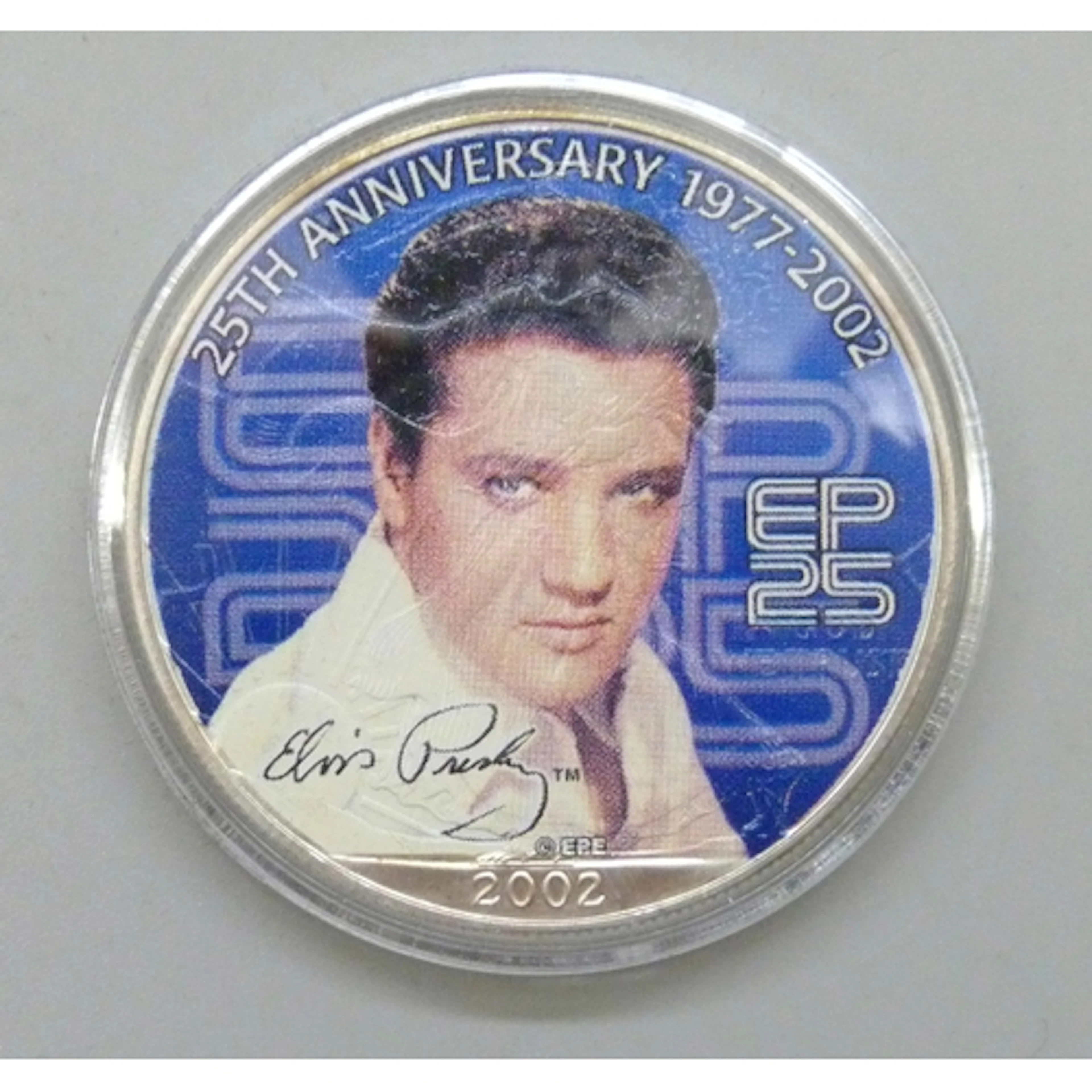 Coins - The Morgan Mint, an Elvis Presley U.S silver eagle c...