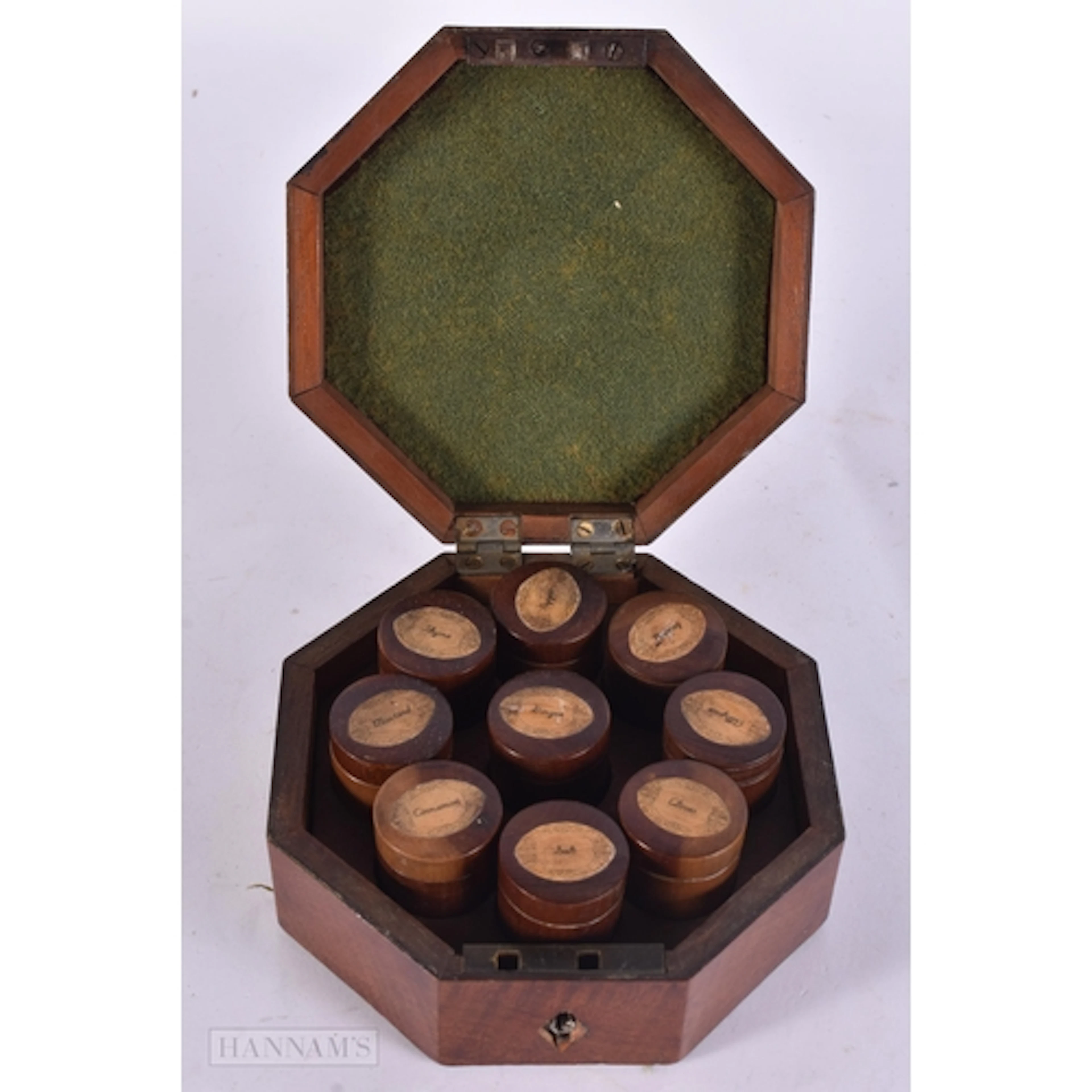 AN ANTIQUE MAHOGANY TREEN SPICE BOX AND COVER. 13.5 cm wide.