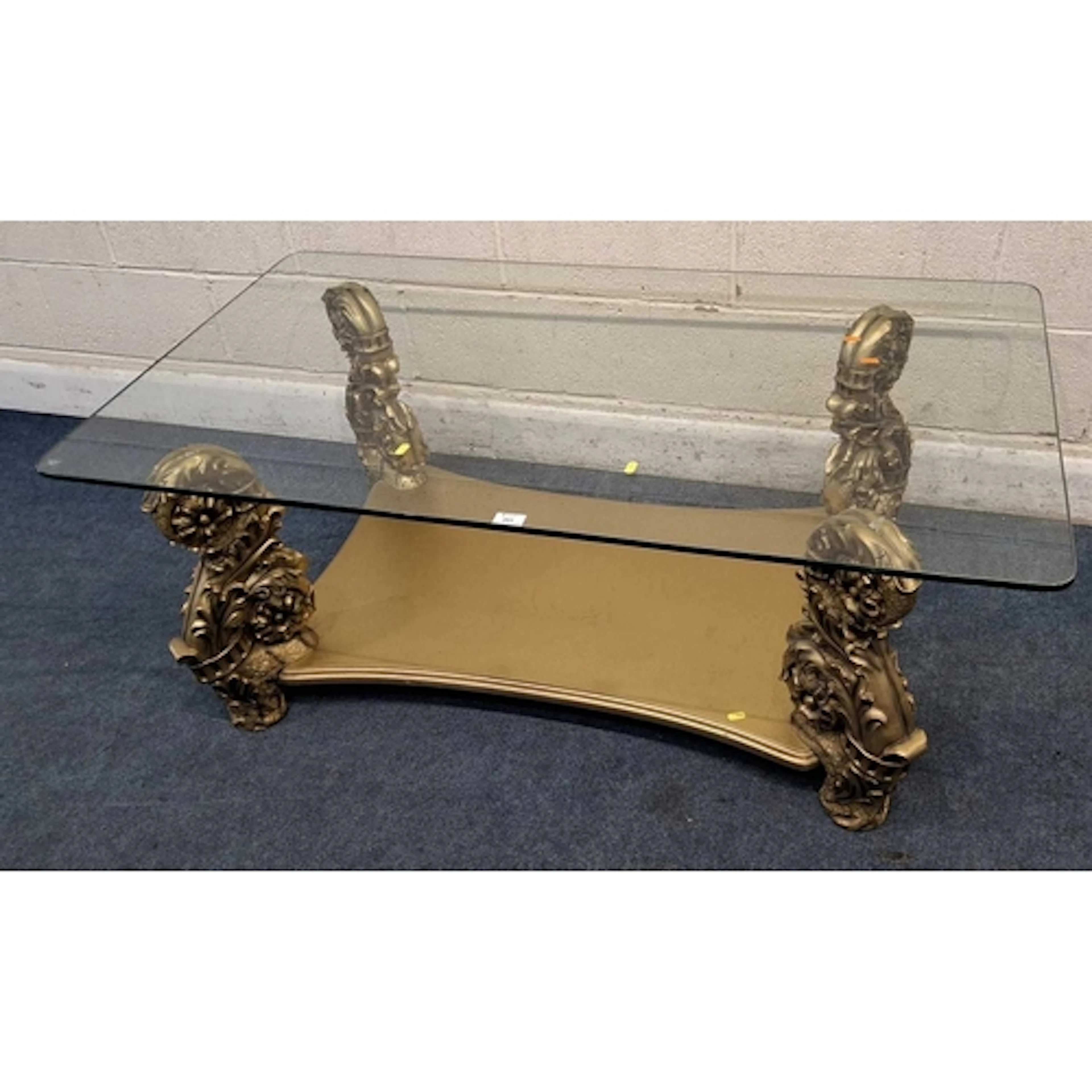 A GILT COFFEE TABLE, with a rectangular glass top (width 13...