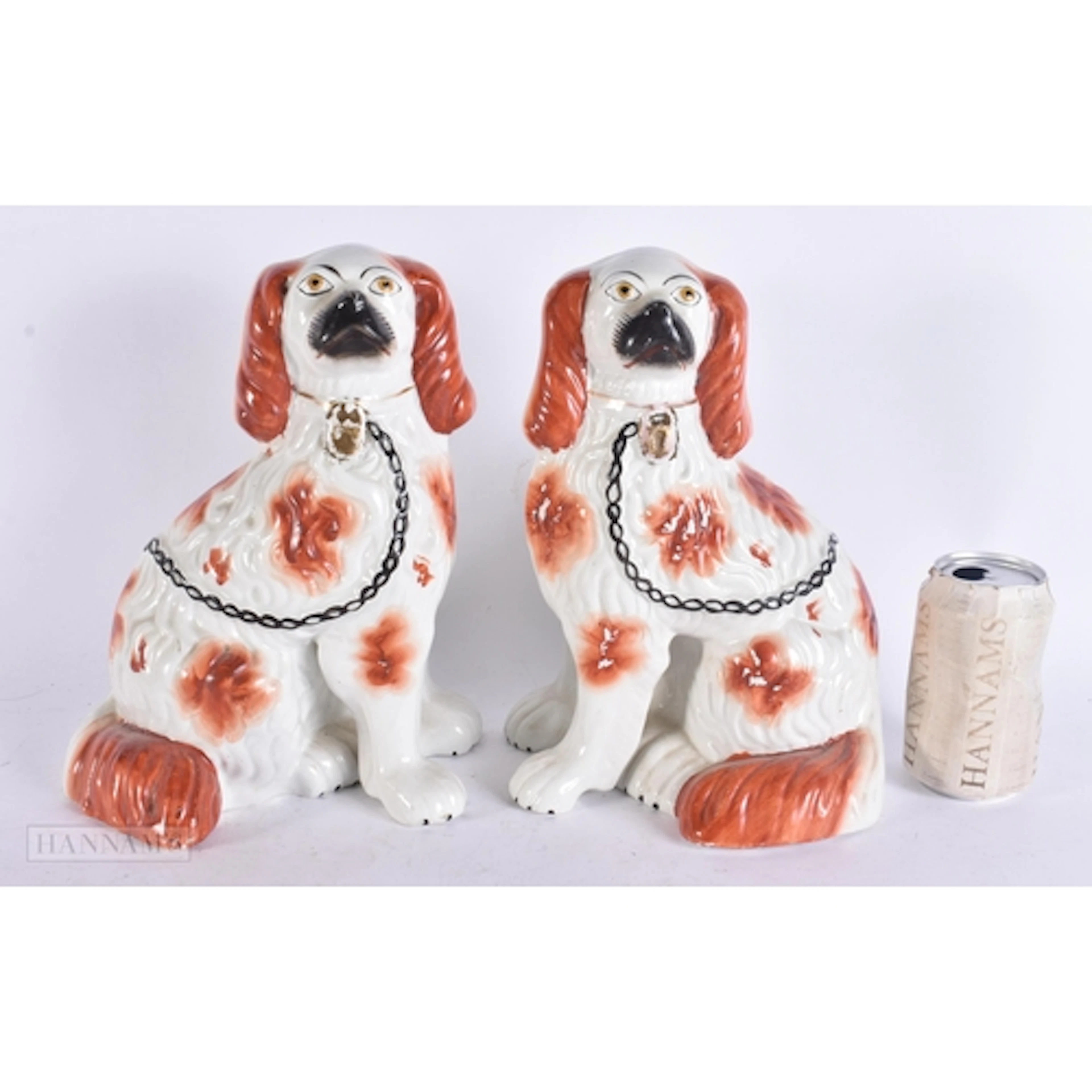 A PAIR OF VICTORIAN RED STAFFORDSHIRE DOGS. 28 cm x 18 cm.