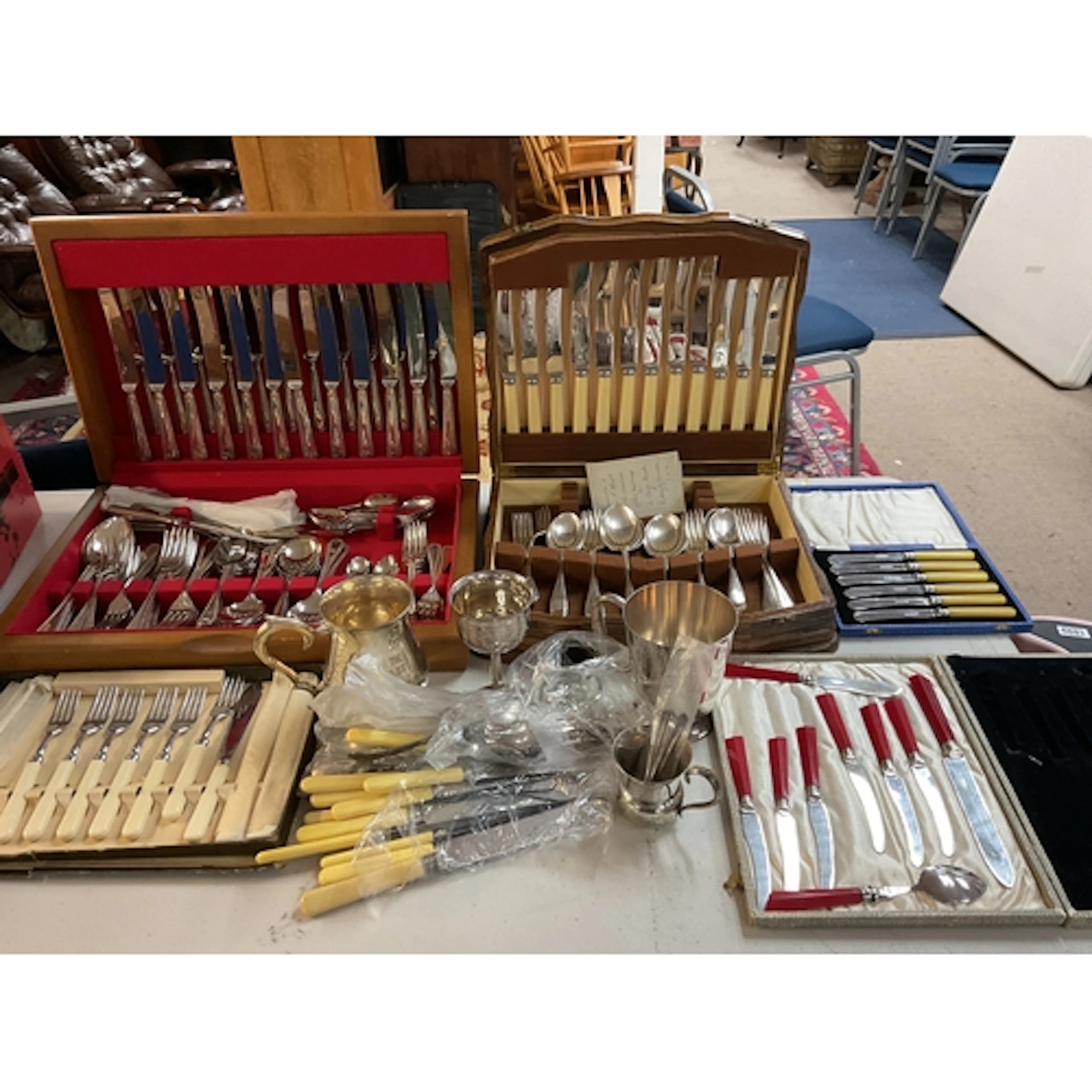 Qty silver plated items and two canteens of cutlery.