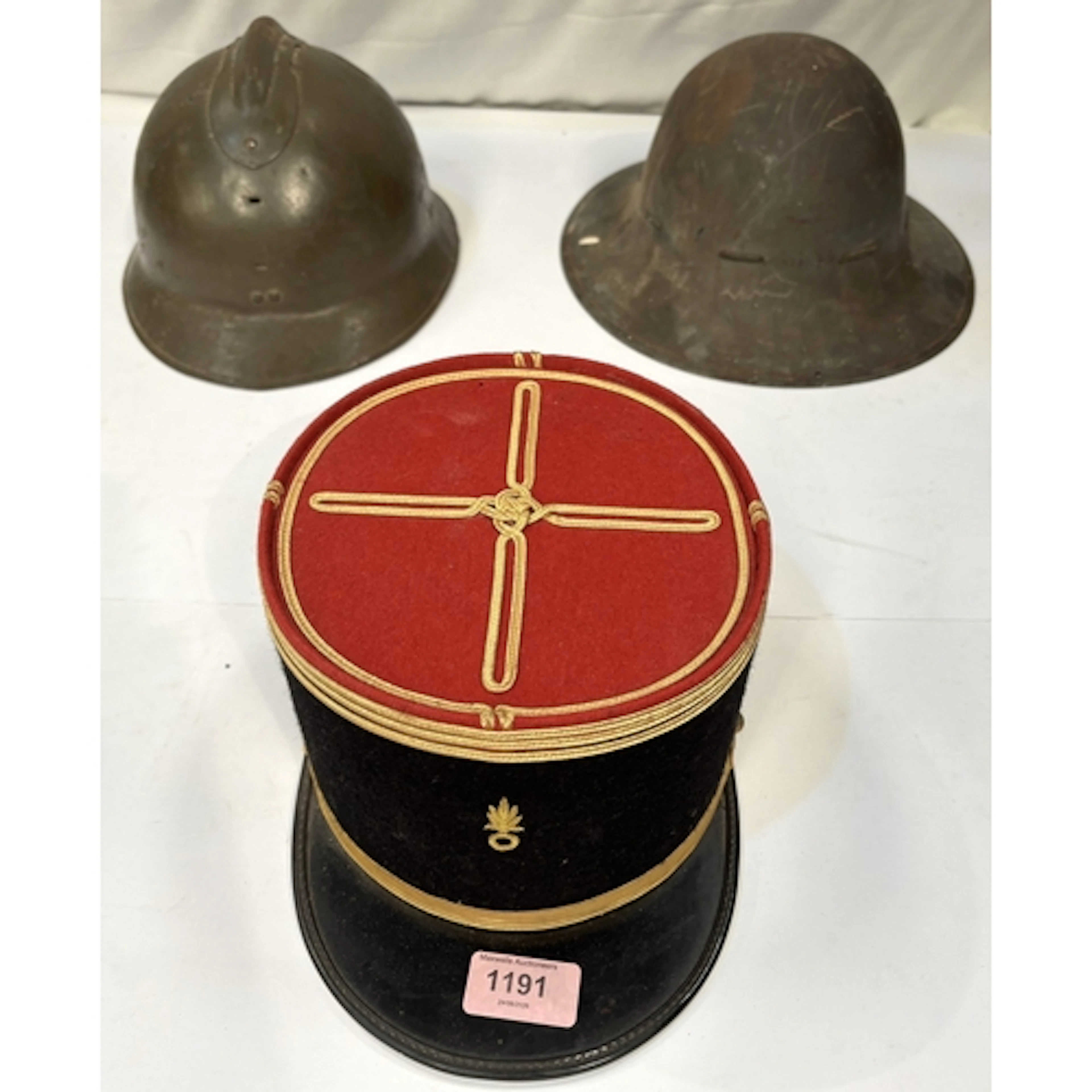 A French military Kapil cap, a French military tin hat and a...