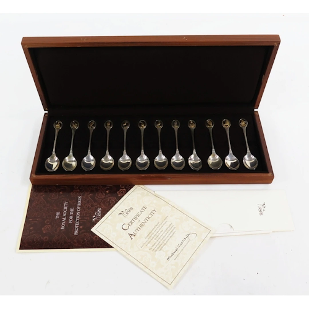 An Elizabeth II set of twelve RSPB spoons, maker John Pinche...