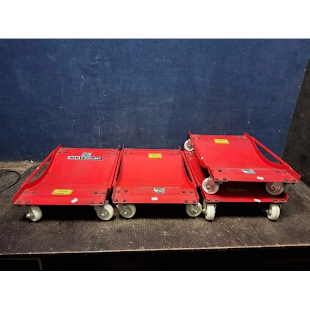 FOUR CLARKE AWD1 WHEELED CAR SKATES LOOK TO HAVE HAD VERY L...