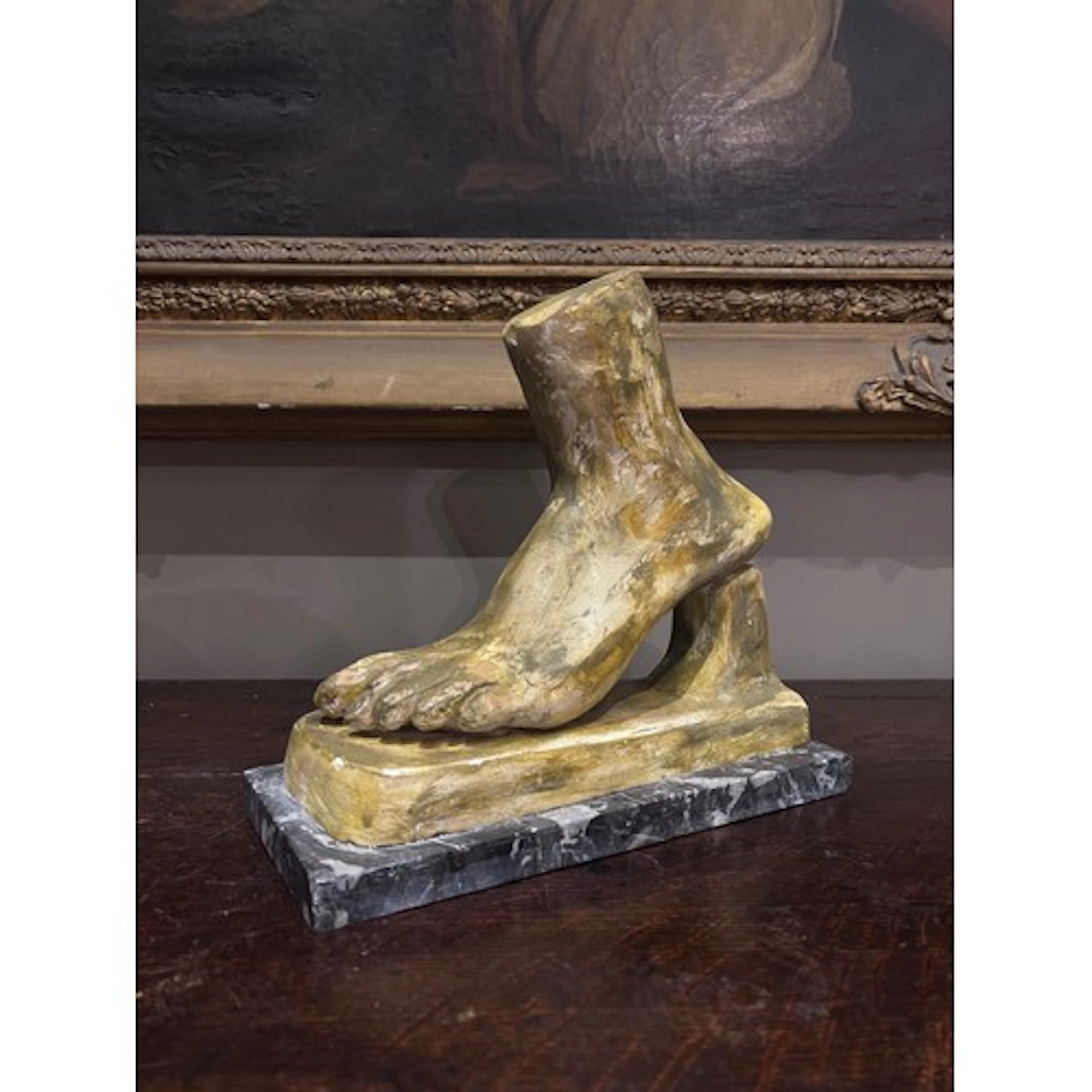 A painted plaster foot in the manner of Domenico Giovanni Br...