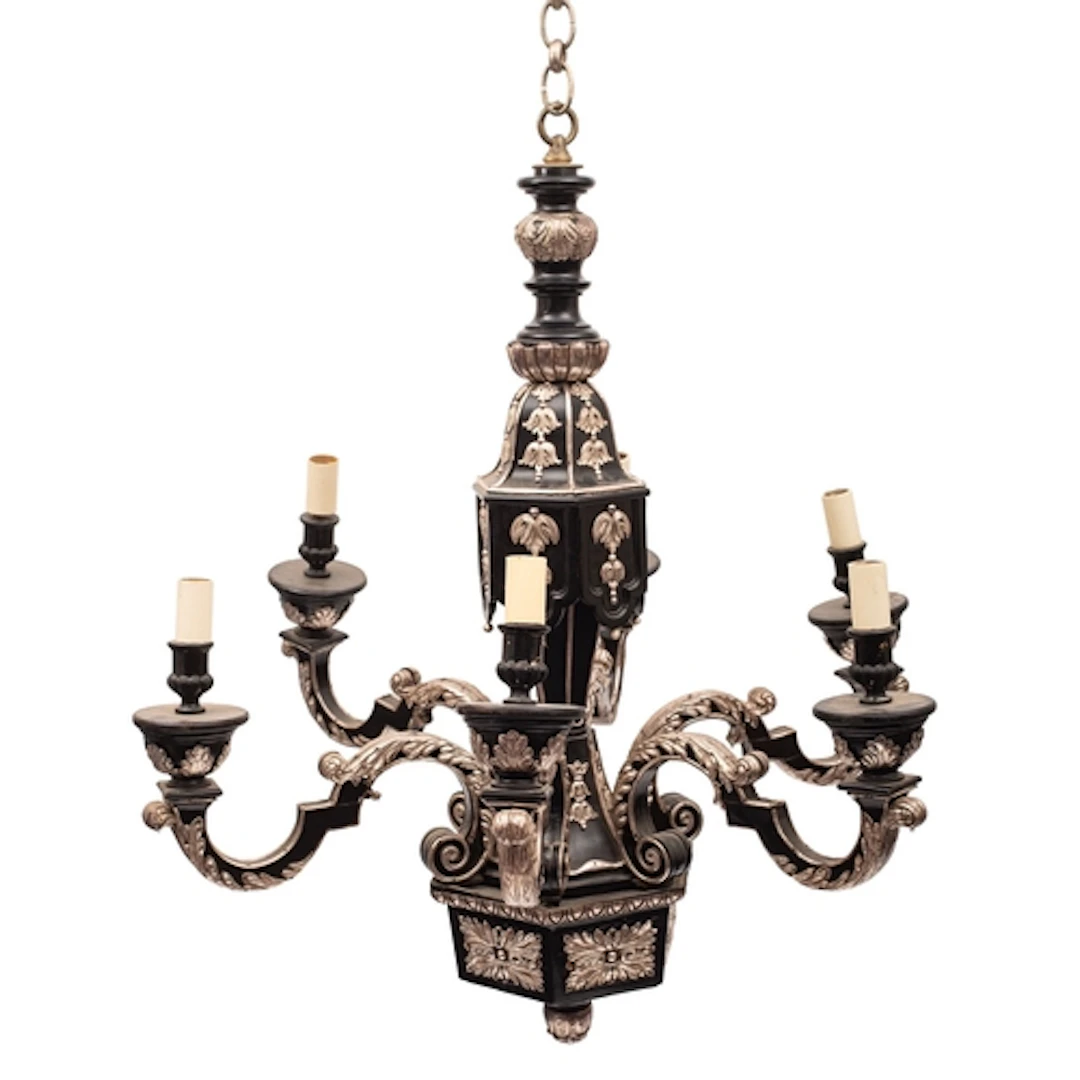 An ebonised wood and silvered metal mounted six light chande...