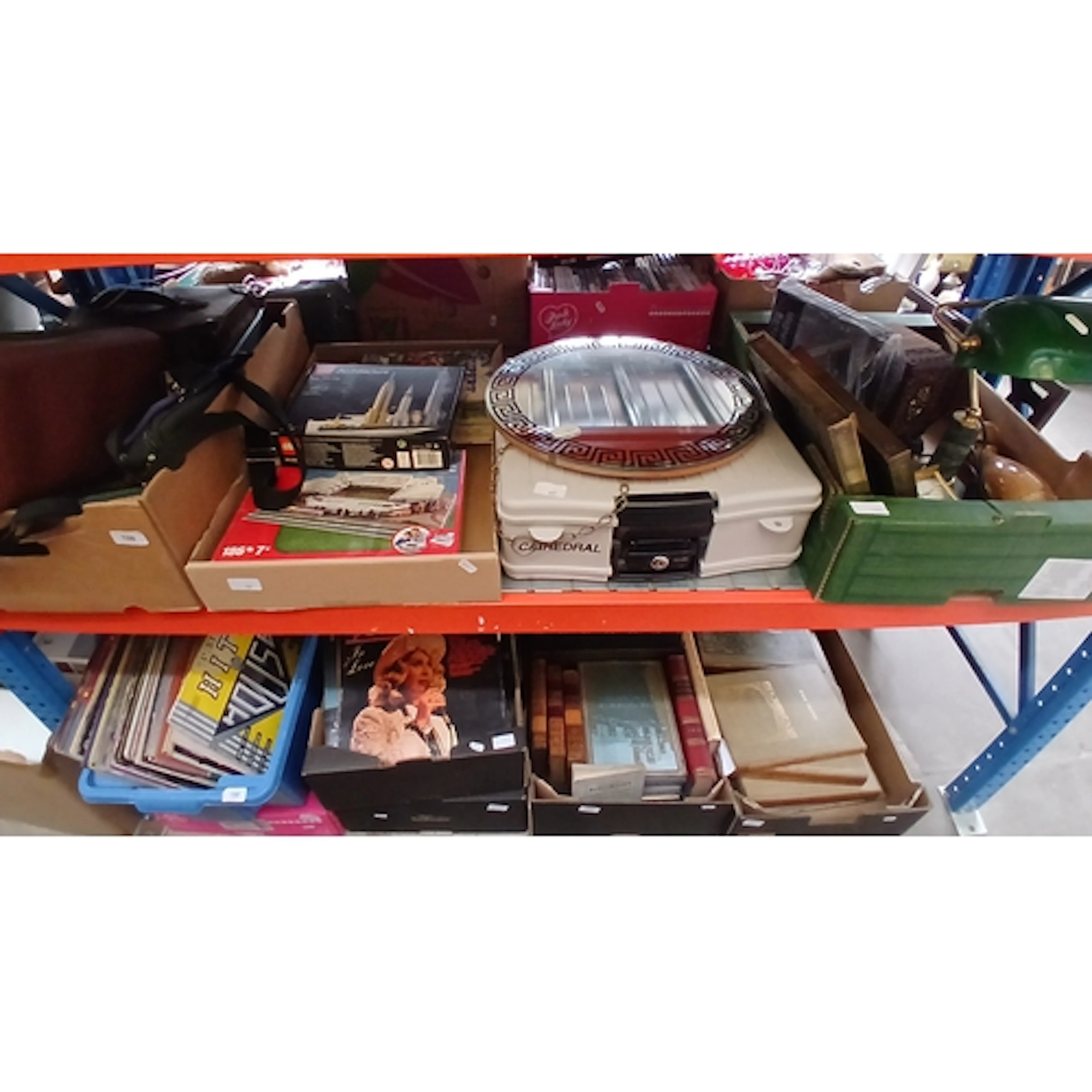 A safety deposit box together with 3 boxes of mixed items in...