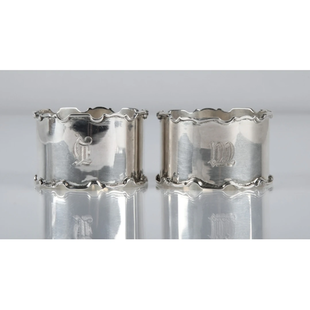 Pair of silver napkin rings monogrammed, cased, gross weight...