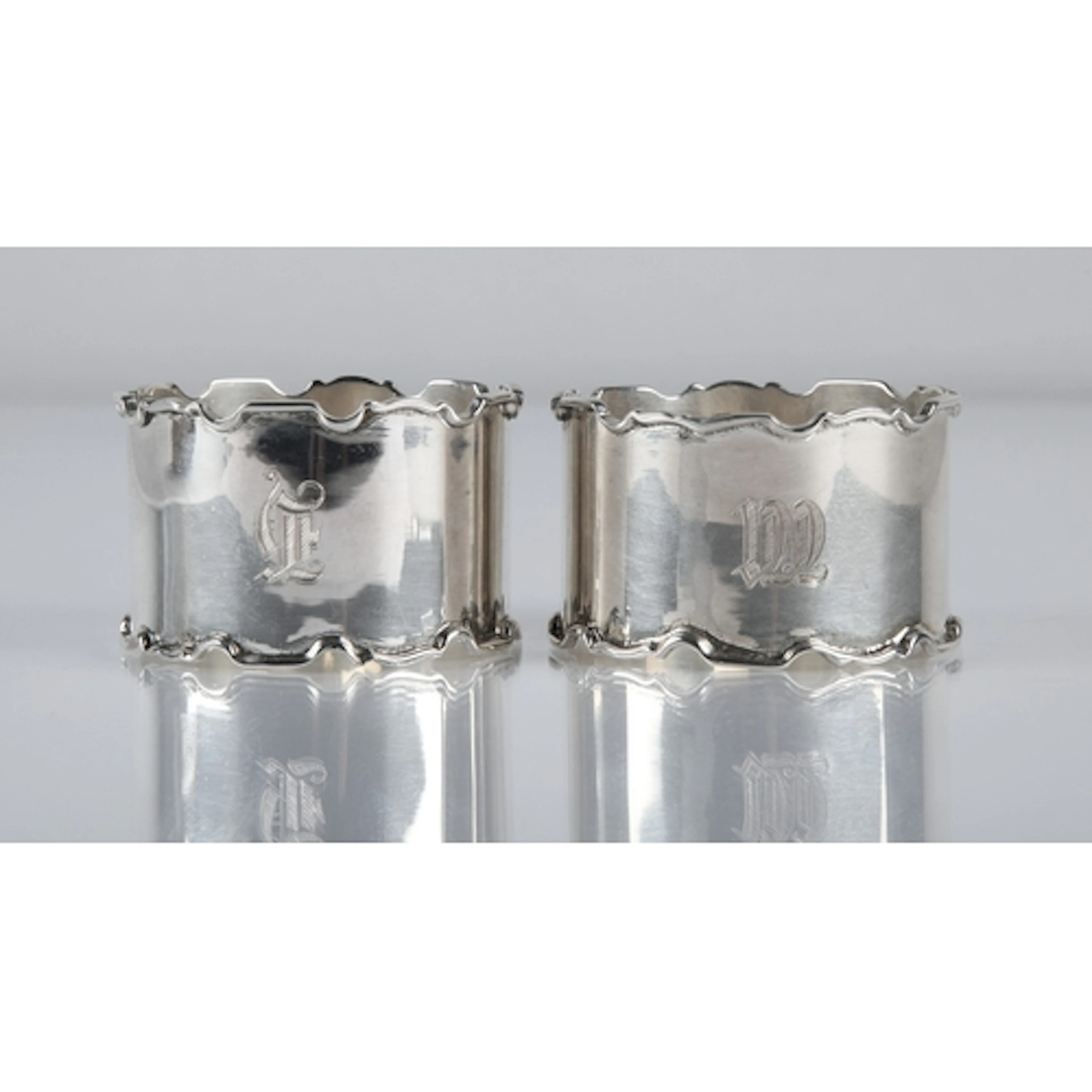 Pair of silver napkin rings monogrammed, cased, gross weight...