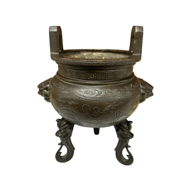 A Japanese bronze tripod censer with cast dragon body, heigh...