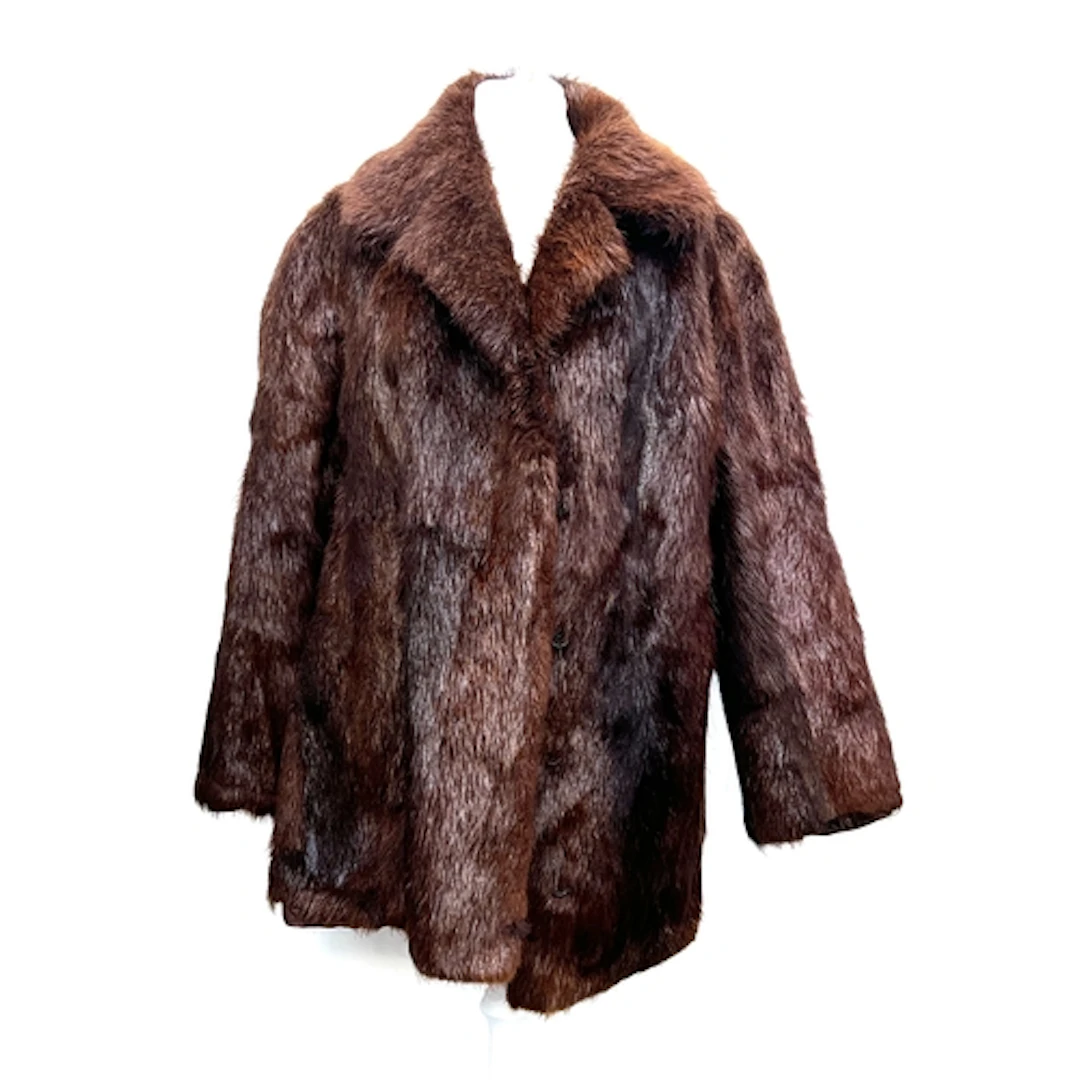 A vintage fur coat with brown silk lining