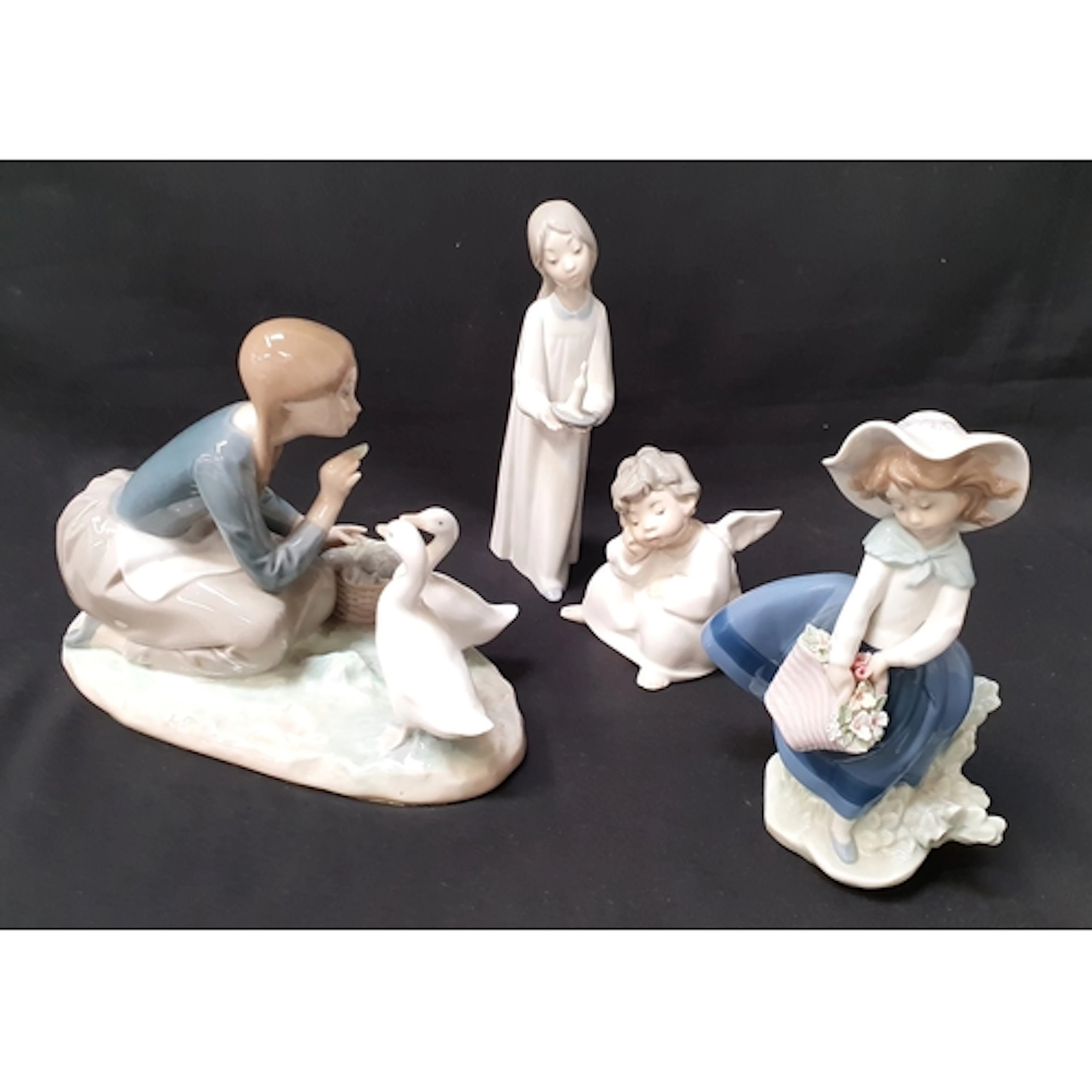 FOUR LLADRO FIGURINES comprising 'Angel Thinking', 4539, 10c...