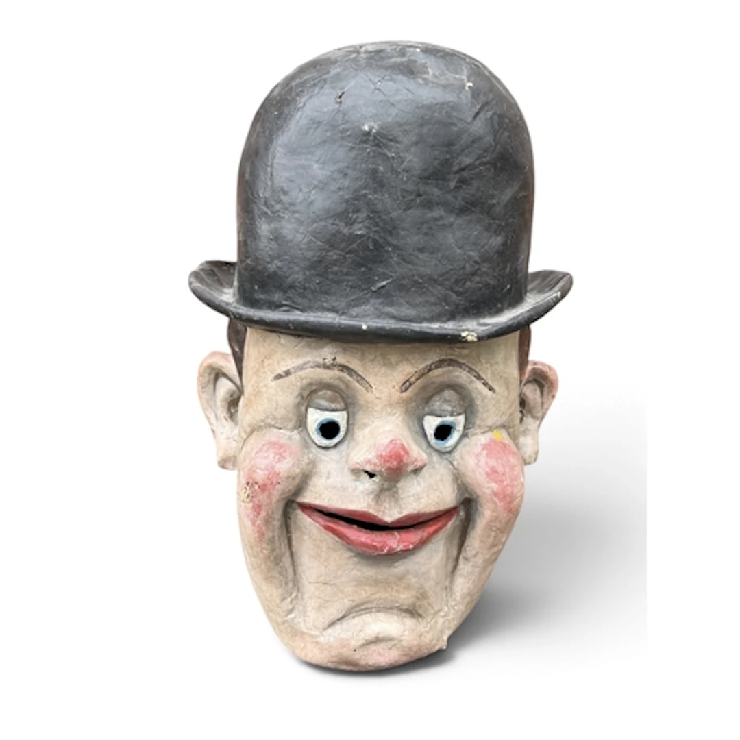 A PAINTED PAPIER-MACHE HEAD OF LAUREL, FROM LAUREL AND HARDY...