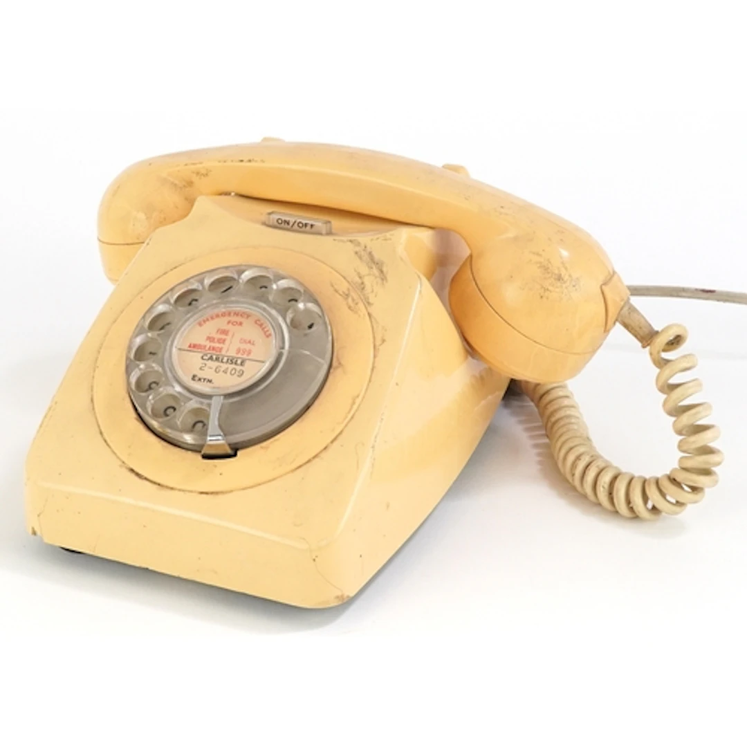 Vintage beige GPO dial telephone.