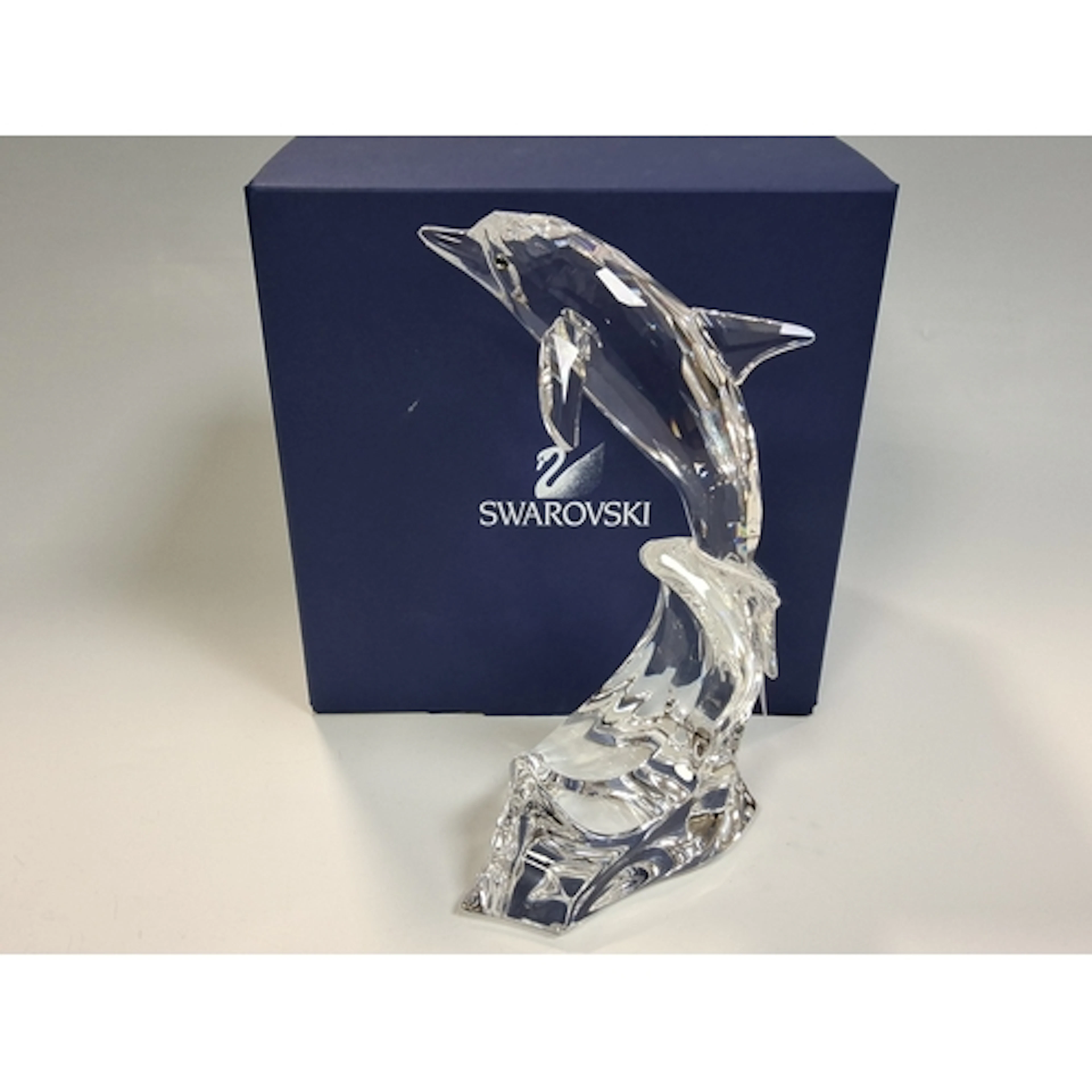 A SWAROVSKI CRYSTAL MAXI DOLPHIN, featuring a retired sculpt...