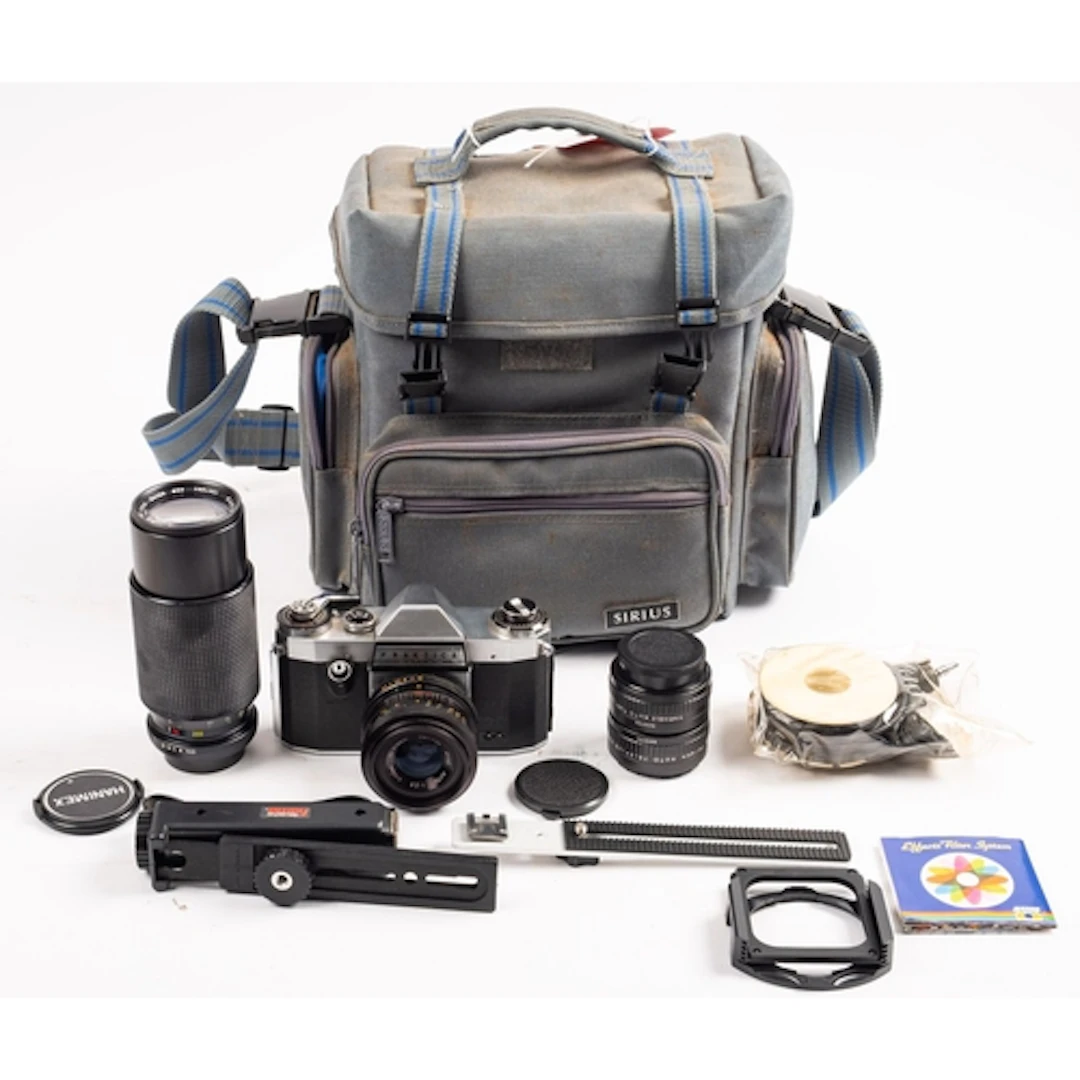 A Praktica 35mm camera outfit. Comprising a Praktica Super T...